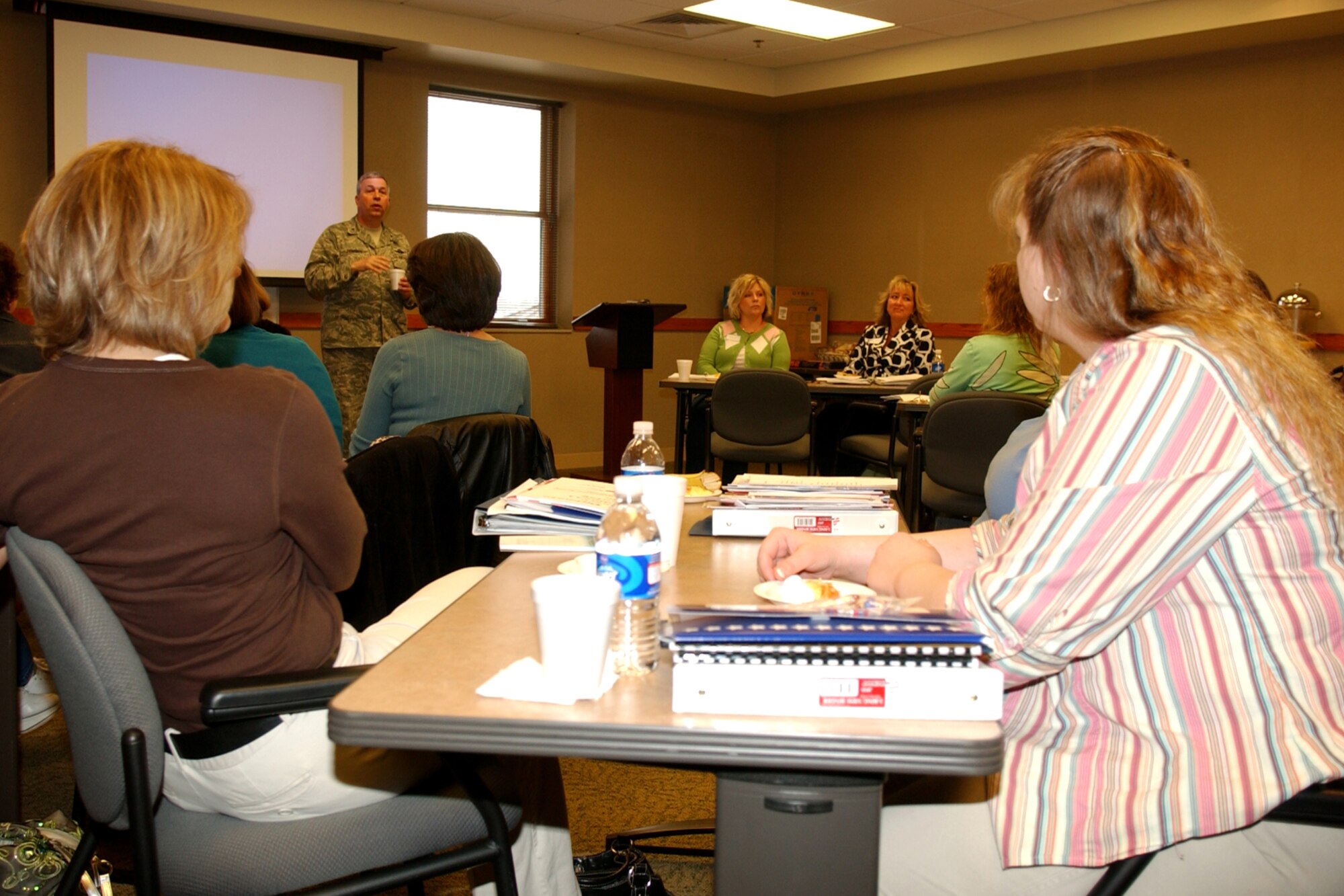 GRISSOM AIR RESERVE BASE, Ind., -- Brig. Gen. Dean Despinoy, 434th Air Refueling Wing commander, briefs spouses during a spouse information fair held during the April unit training assembly. Attendees were briefed on education benefits, deployments, Tri-Care, legal issues and more by a variety of agencies on base. (U.S. Air Force photo/Senior Airman Chris Bolen)                          