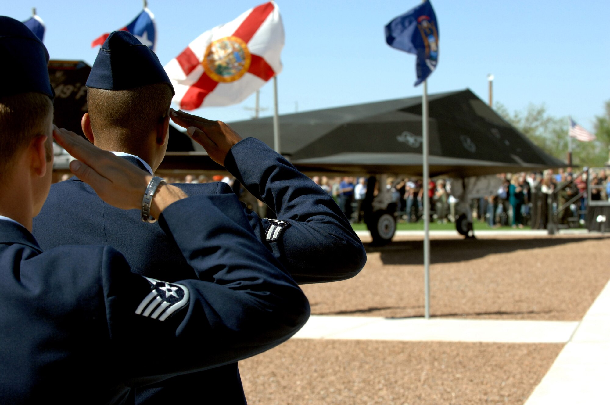 Airmen from Team Holloman salute during the Sunset Stealth F-117A Retirement Ceremony Apr 21, Holloman Air Force Base, N.M.
(U.S. Air Force photo/ Senior Airman Anthony Nelson Jr)

