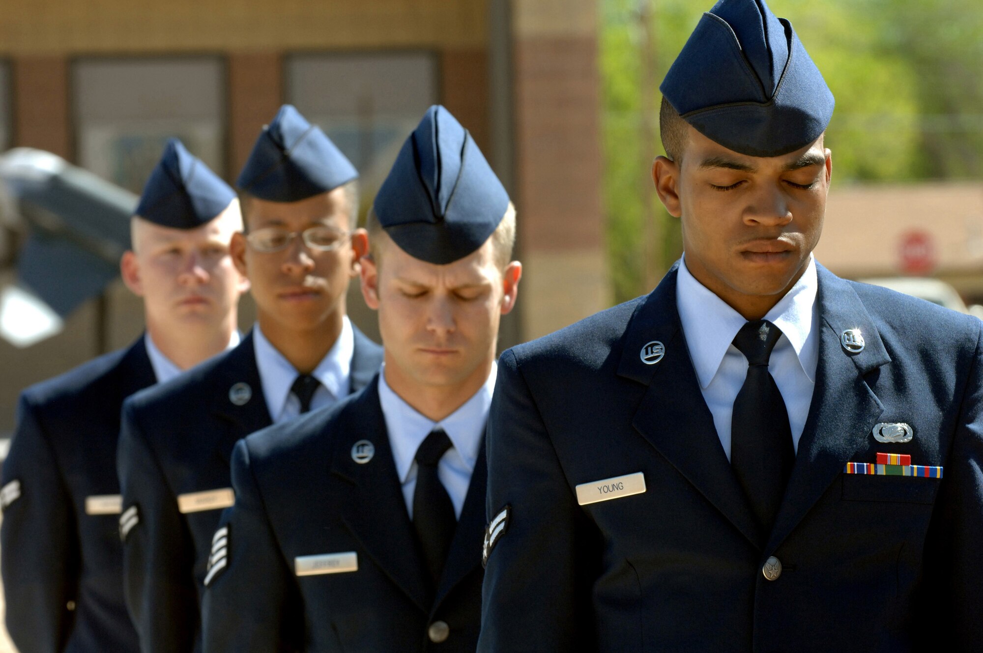 Airman 1st Class Thomas Young, 49th Material Maintenance Group, bows his head during the invocation of the Sunset Stealth F-117A Retirement Ceremony Apr 21, Holloman Air Force Base, N.M.
(U.S. Air Force photo/ Senior Airman Anthony Nelson Jr)

