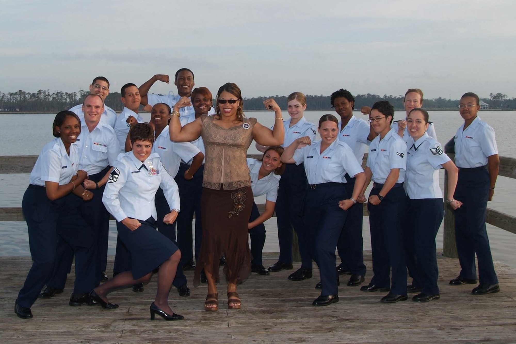 Master Sgt. Tina Robinson poses with a group of her technical school students at graduation last year. She was born in Brooklyn, N.Y. and grew up in Wilmington, N.C.  Her home station is Keesler Air Force Base, Miss.  She is a reservist and is assigned as the first sergeant for the mission support flight. Her full-time job is a technical school instructor for the Basic Personnel Apprentice Course at Keesler. (Courtesy photo)