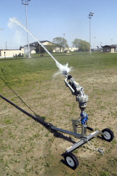 The sprinkler system waters the field at the Base Track. (U.S. Air Force photo/Airman 1st Class Shen-Chia Chu)