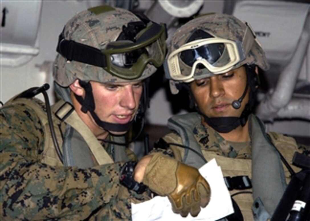 U.S. Marines aboard USS Nashville study orders for maritime interdiction operations during Phoenix Express 2008 NATO interoperability training mission, April 16, 2008.
