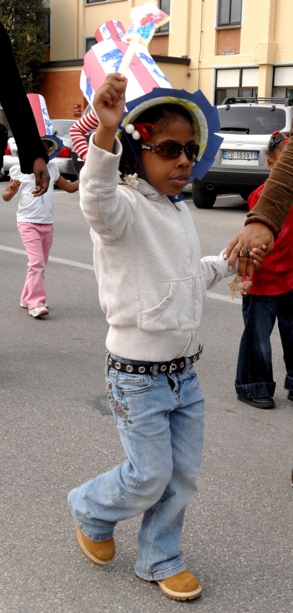 AVIANO AIR BASE, Italy--Essence West dances to music being played during the parade. Hosted by the Area 1 CDC, the parade is one of many events held throughout the month of April honoring the sacrifices military children make for their parents. (U.S. Air Force photo/Airman 1st Class Tabitha Mans).