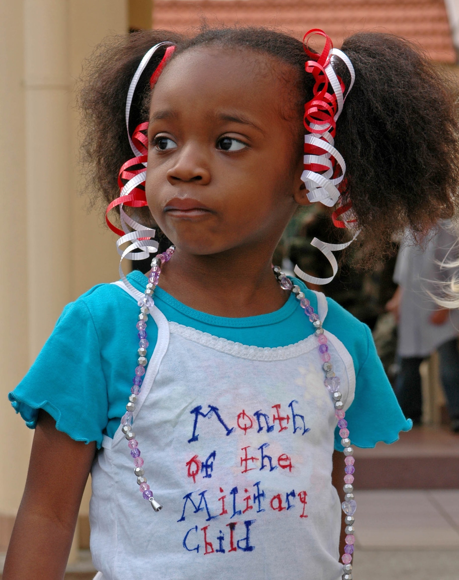 AVIANO AIR BASE, Italy--Tianna Bonner proudly displays her Month of the Military Child t-shirt during the annual CDC military child parade at Area 1. (U.S. Air Force photo/Senior Airman Justin Weaver).
