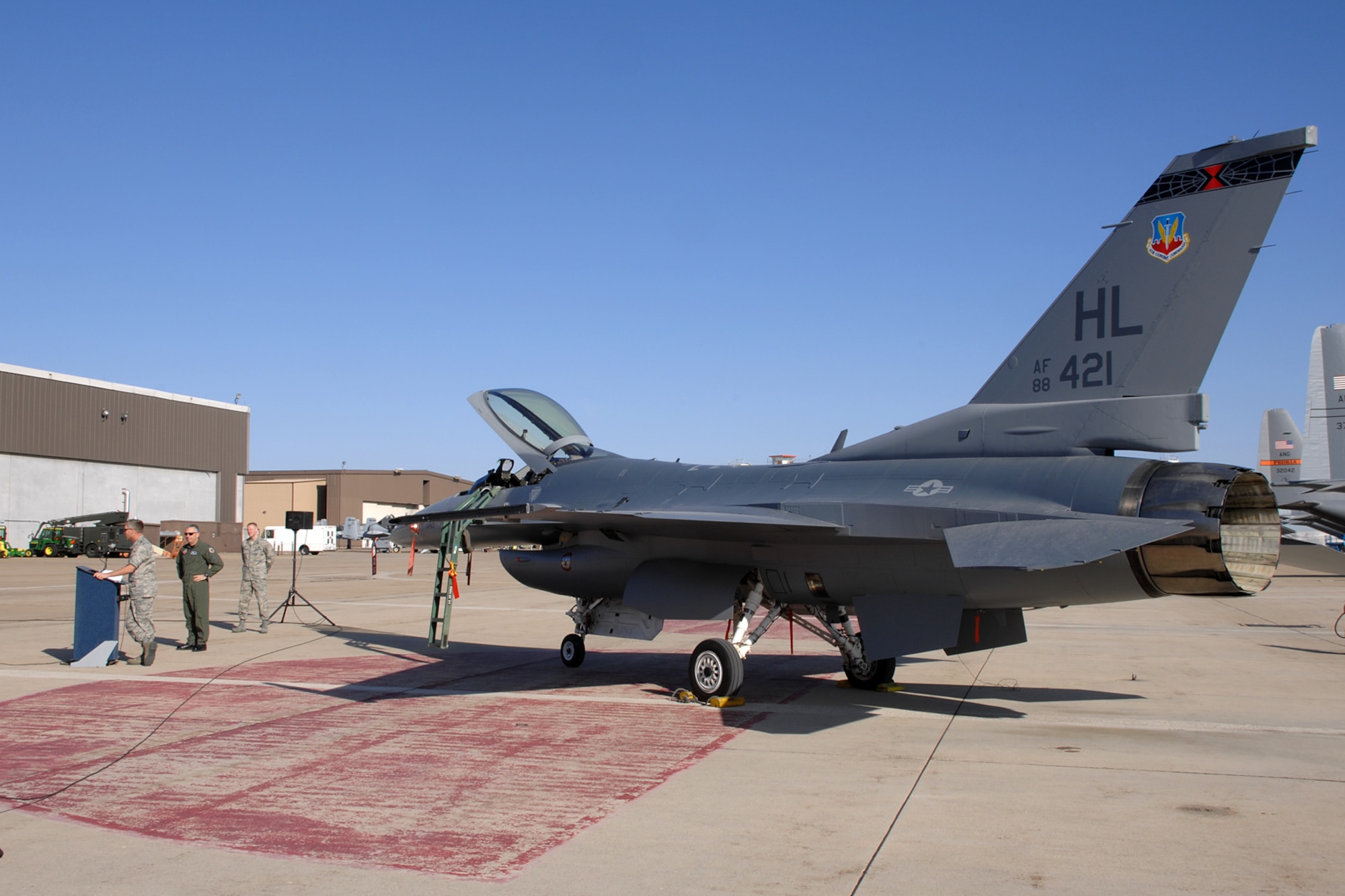 The final 388th Fighter Wing Block 40 F-16 to undergo Common Configuration Implementation Program upgrades is handed over to Col. Scott Dennis, 388th FW commander, in a ceremony April 21.  Beginning in November 2005, depot workers from the 309th Maintenance Wing, led by Brig. Gen. Art Cameron, invested over 5,500 maintenance hours into each of 388th FW's 72 aircraft.  CCIP brings upgraded avionics and communications systems to pilots in combat.  Hill's 4th Fighter Squadron was the first to fly CCIP F-16s in combat in August 2007.  (U.S. Air Force photo by Alex Lloyd) 