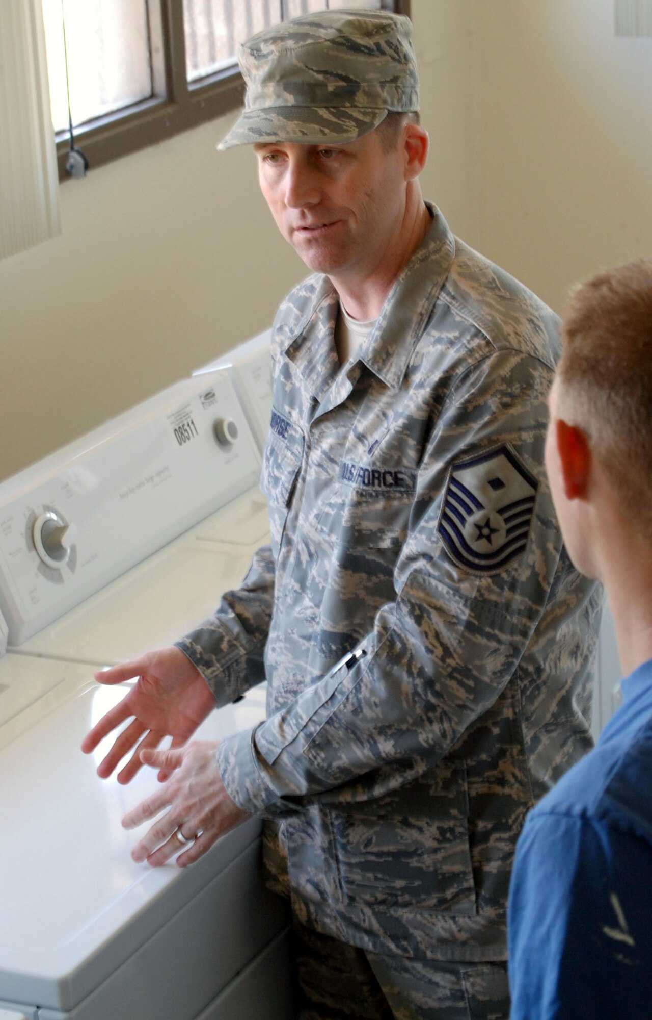 LAUGHLIN AIR FORCE BASE, Texas – Master Sgt. Joe Morse, 47th Mission Support Group first sergeant, explains the standards he expects when inspecting dormitories to Airmen here April 28. First sergeants are responsible for the morale, safety and welfare of all enlisted members. (U.S. Air Force photo by Airman 1st Class Sara Csurilla) 