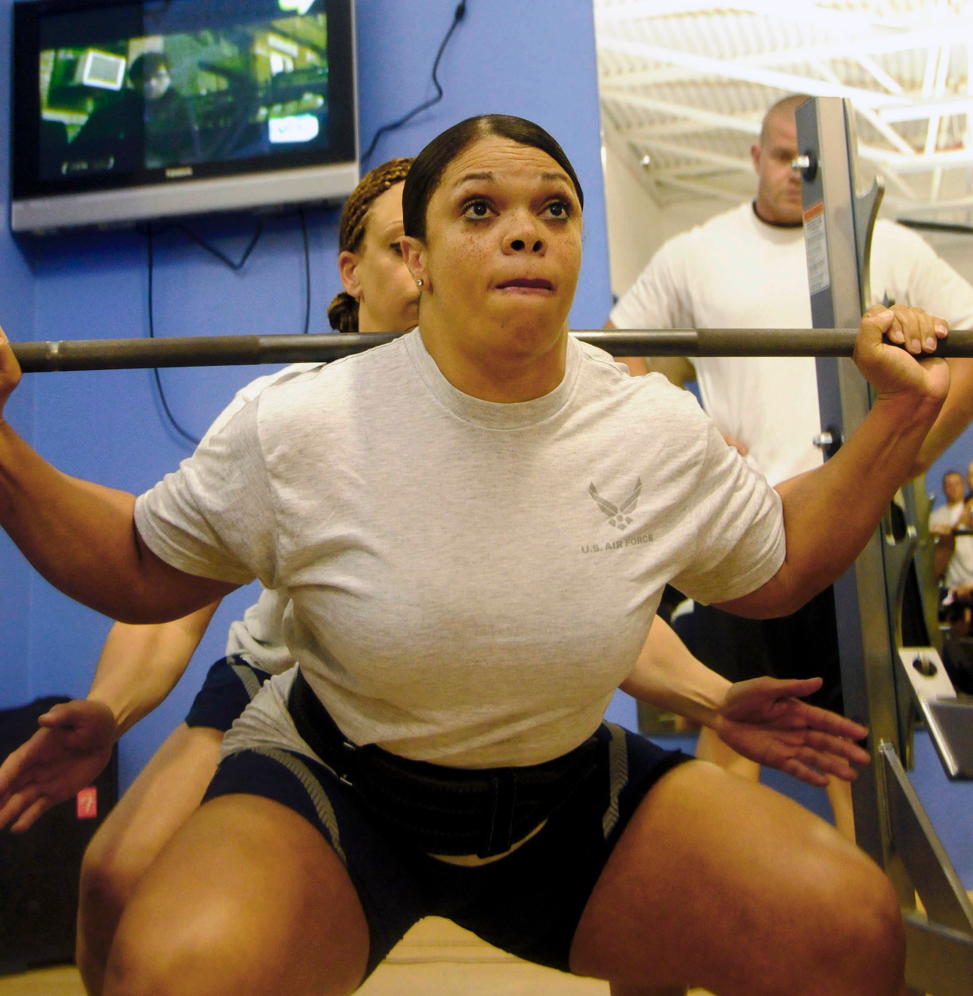 Master Sgt. Tina Robinson squats 300 pounds at the fitness center at an air base in Southwest Asia.  She was named "Strongest (female) in the AOR" recently after placing first in the women's category of an Air Forces Central powerlifting competition.  Sergeant Robinson, deployed from Keesler Air Force Base, Miss., is the 746th Expeditionary Airlift Squadron first sergeant.  (U.S. Air Force photo/Senior Airman Domonique Simmons)