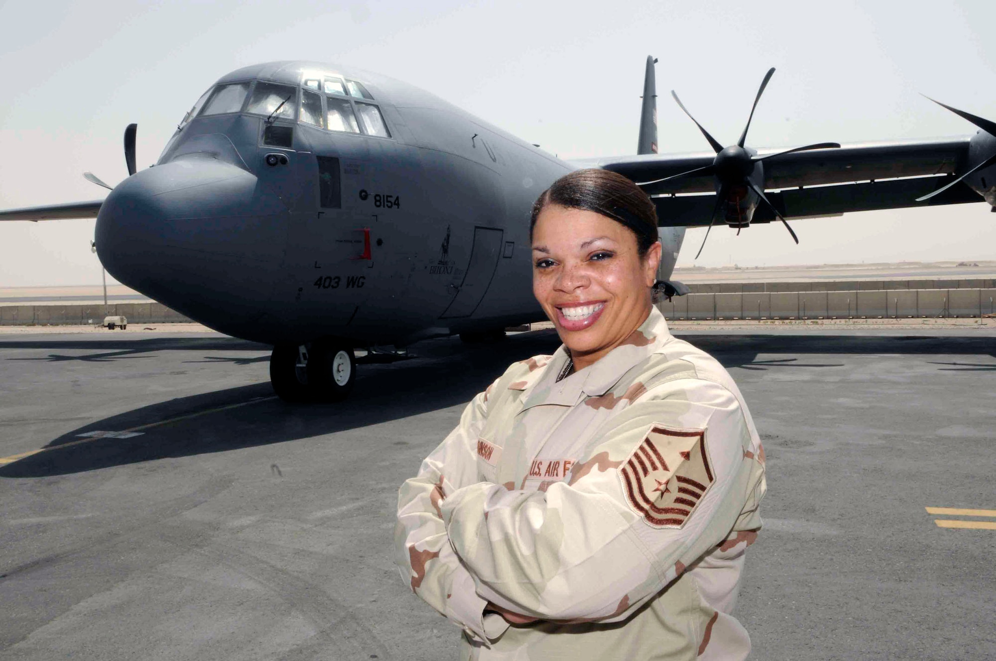 Master Sgt. Tina Robinson was recently named "Strongest (female) in the AOR" after placing first in the women's category of an Air Forces Central powerlifting competition at an air base in Southwest Asia.  Sergeant Robinson, deployed from Keesler Air Force Base, Miss., is the 746th Expeditionary Airlift Squadron first sergeant.  (U.S. Air Force photo/Tech. Sgt. Johnny Saldivar)  