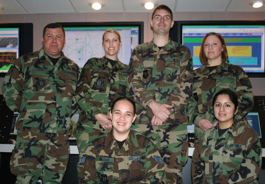 The 919th Special Operations Wing command post was recognized as the best small command post in Air Force Reserve Command's 2007 Command and Control awards. Senior Master Sgt. David Mooers (back row, third from left) was also recognized as AFRC's Senior NCO of the Year for Command and Control. Command post members pictured here are (back row, left to right) Tech. Sgt. Luis Lopez, Staff Sgt. Shannon Riley, Sergeant Mooers, and Tech. Sgt. Lici Coleman; and (front row, left to right) Staff Sergeants Ericka Gilliam and Elaine Alonzo. (U.S. Air Force Photo/Master Sgt. Buffy Galbraith)