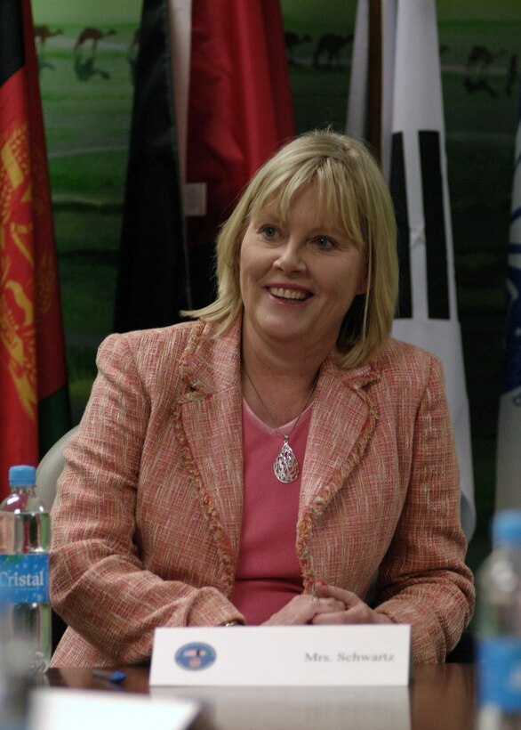 Suzie Schwartz listens to a story during a women's affairs seminar at Bagram Air Base, Afghanistan, recently.  Mrs. Schwartz is the wife of Gen. Norton Schwartz, U.S. Transportation Command commander. (U.S. Air Force photo/Master Sgt. Demetrius Lester)