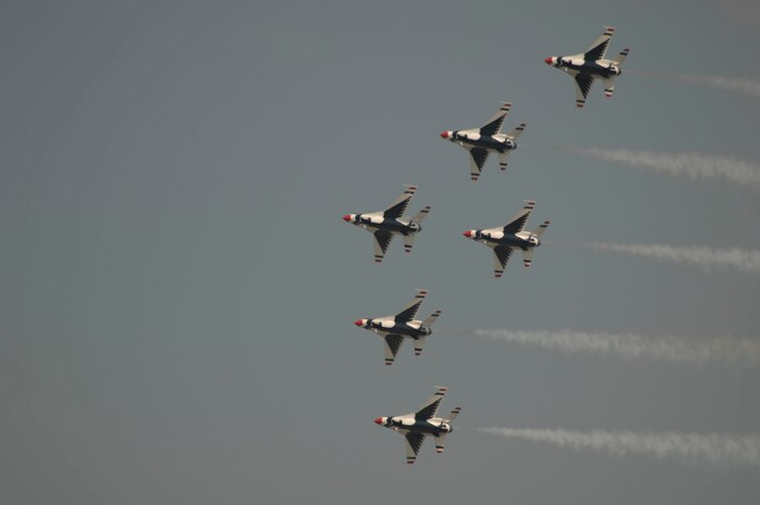 The Air Force Thunderbirds perform a pass across airshow central during the 2008 "Wings Over Charleston" Air Expo at Charleston AFB April 26. The biennial expo hosted by the 437th Airlift Wing allowed American's the opportunity to meet and greet Airmen and view civilian and military aircraft. (U.S. Air Fore photo/Master Sgt. Sean Houlihan)