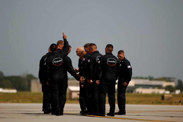 The Air Force Thunderbirds crew chiefs conclude their ground performance during the 2008 "Wings Over Charleston" Air Expo at Charleston AFB April 26. More than 136,000 people visited the base during the one-day expo highlighting the Airmen and aircraft of the world's most dominant air, space and cyberspace Air Force. (U.S. Air Fore photo/Senior Airman Nicholas Pilch)