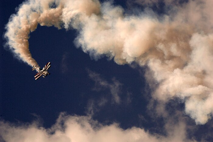 Ken Appezzato flies a Pitts S-2C performing aerial aerobatics during the 2008 "Wings Over Charleston" Air Expo at Charleston AFB April 26. Visitors at the Air Expo were able to watch the Thunderbirds, C-17A Globemaster III, F-22 Raptor, F-15 Strike Eagle along with other military and civilian aircraft perform as well as static displays of aircraft. (U.S. Air Fore photo/Senior Airman Nicholas Pilch)