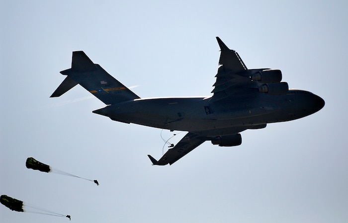 Army Soldiers from the 82nd Airborne, Fort Bragg, N.C. parachute from a C-17 Globemaster III during the 2008 "Wings Over Charleston" Air Expo at Charleston AFB April 26. More than 136,000 people visited the base during the one-day expo highlighting the Airmen and aircraft of the world's most dominant air, space and cyberspace Air Force. (U.S. Air Fore photo/Senior Airman Nicholas Pilch)
