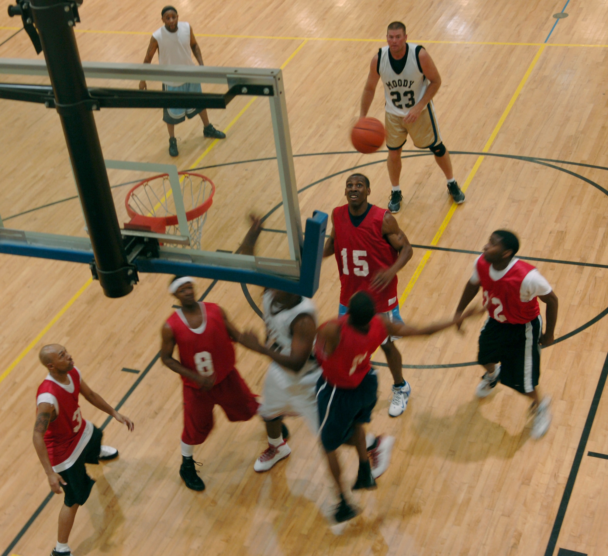 MOODY AIR FORCE BASE, Ga. – Airmen participating in the Intramural versus Over-30 All Star basketball game attempt to rebound an errant shot here April 24. The Over 30 All-Star team defeated the Intramural team by a score of 71- 65. (U.S Air Force photo by Senior Airman Schelli Jones) 