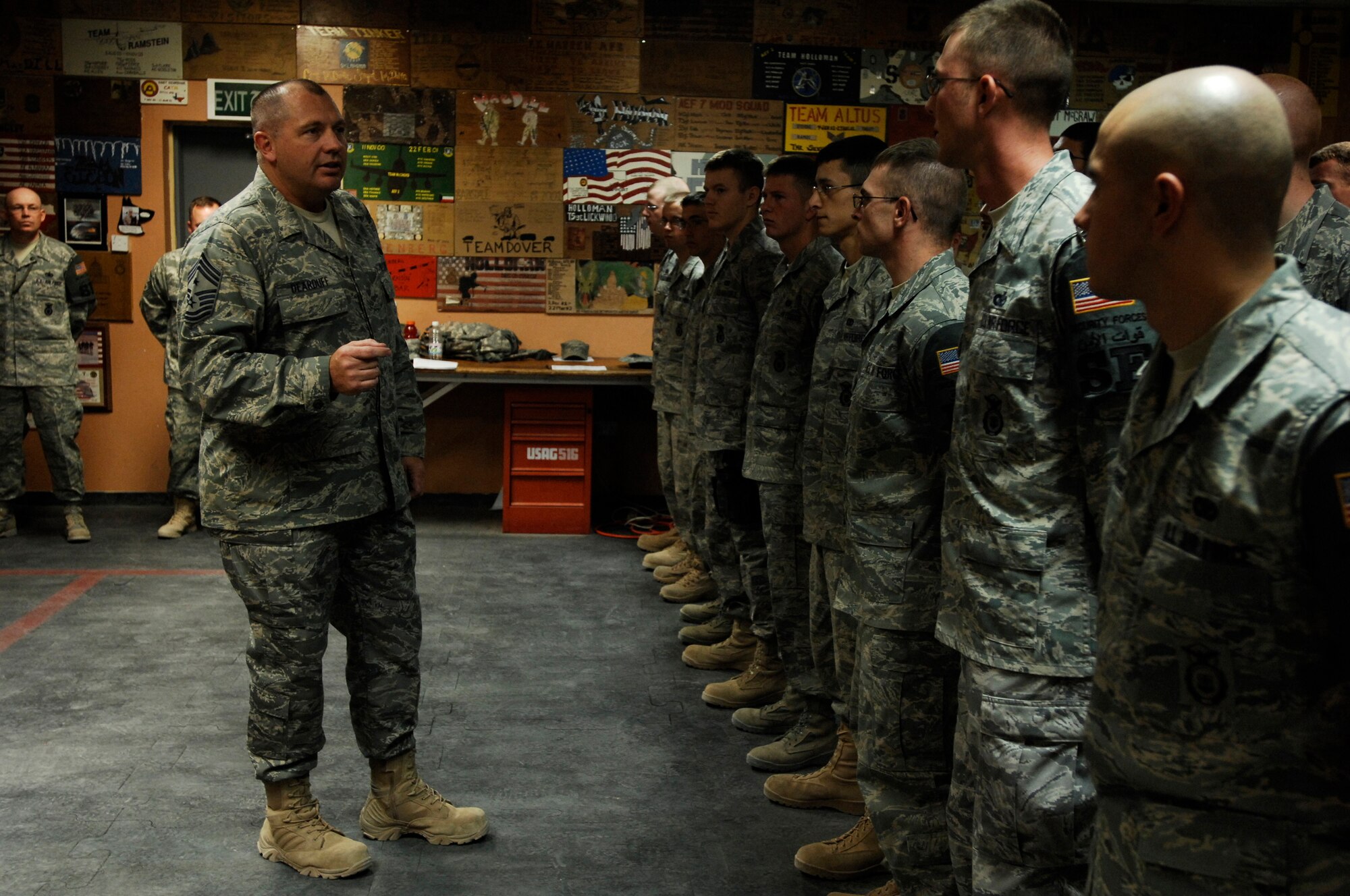 SOUTHWEST ASIA -- Chief Master Sergeant Scott Dearduff, the new command chief for Ninth Air Force and United States Air Forces Central, Shaw Air Force Base, S.C., talks to Airmen deployed to the 386th Expeditionary Security Forces Squadron during guard mount April 23, 2008, at an air base in the Persian Gulf Region. Chief Dearduff is visiting Airmen throughout the area of responsibility to get a first-hand look at Airmen accomplishing a variety of different mission sets supporting the Global War on Terrorism. (U.S. Air Force photo/ Staff Sgt. Patrick Dixon) 