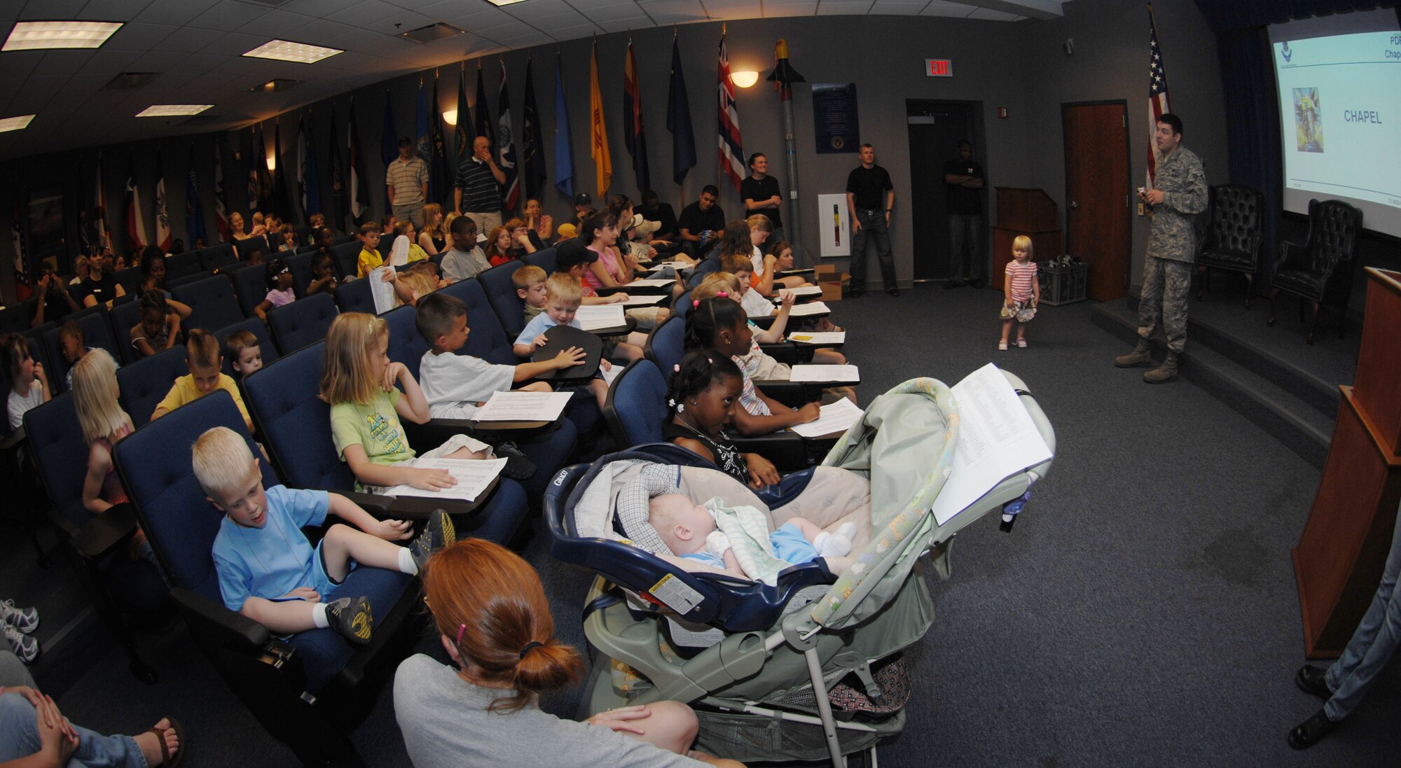 MOODY AIR FORCE BASE, Ga. – Senior Airman Jason Smith, 23rd Wing Chaplin’s assistant, gives a briefing during the kid’s deployment line here April 26.  Airman Smith informed the children on ways the chapel can help while their parents are deployed. (U.S. Air Force photo by Senior Airman Angelita Lawrence)