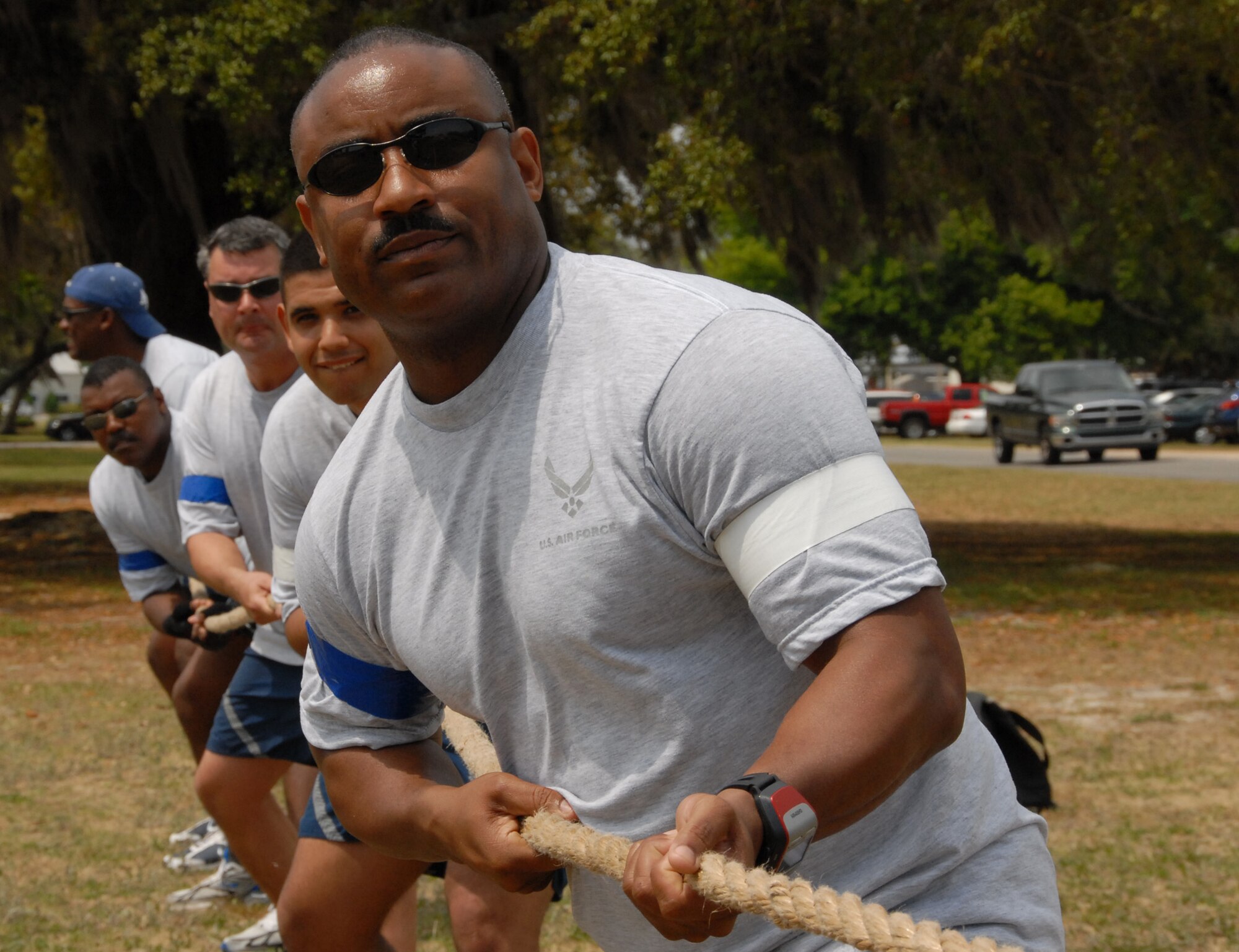 (Front to back) Master Sgt. Walter Greene, 2nd Lt. Juan Morales, Lt. Col. John Arnold, Capt. Meredithe Jessup, and Maj. Don Hilliard represented the 36th Electronic Warfare Squadron during their tug-a-war match against the 68th Electronic Warfare Squadron at the 53d EWG Sports Day April 25 at Eglin Air Force Base, Fla.  Photo by Staff Sgt. Samuel King Jr.
