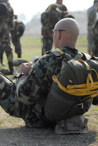 SOTO CANO AIR BASE, Honduras-An Army paratrooper waits for a helicopter  at Tamara Drop Zone near Tegucigalpa, Honduras, April 23 during Iguana Voladora 2008, a combined airborne operation in which jumpers represented 17 American countries. (U.S. Air Force photo by Tech. Sgt. William Farrow)