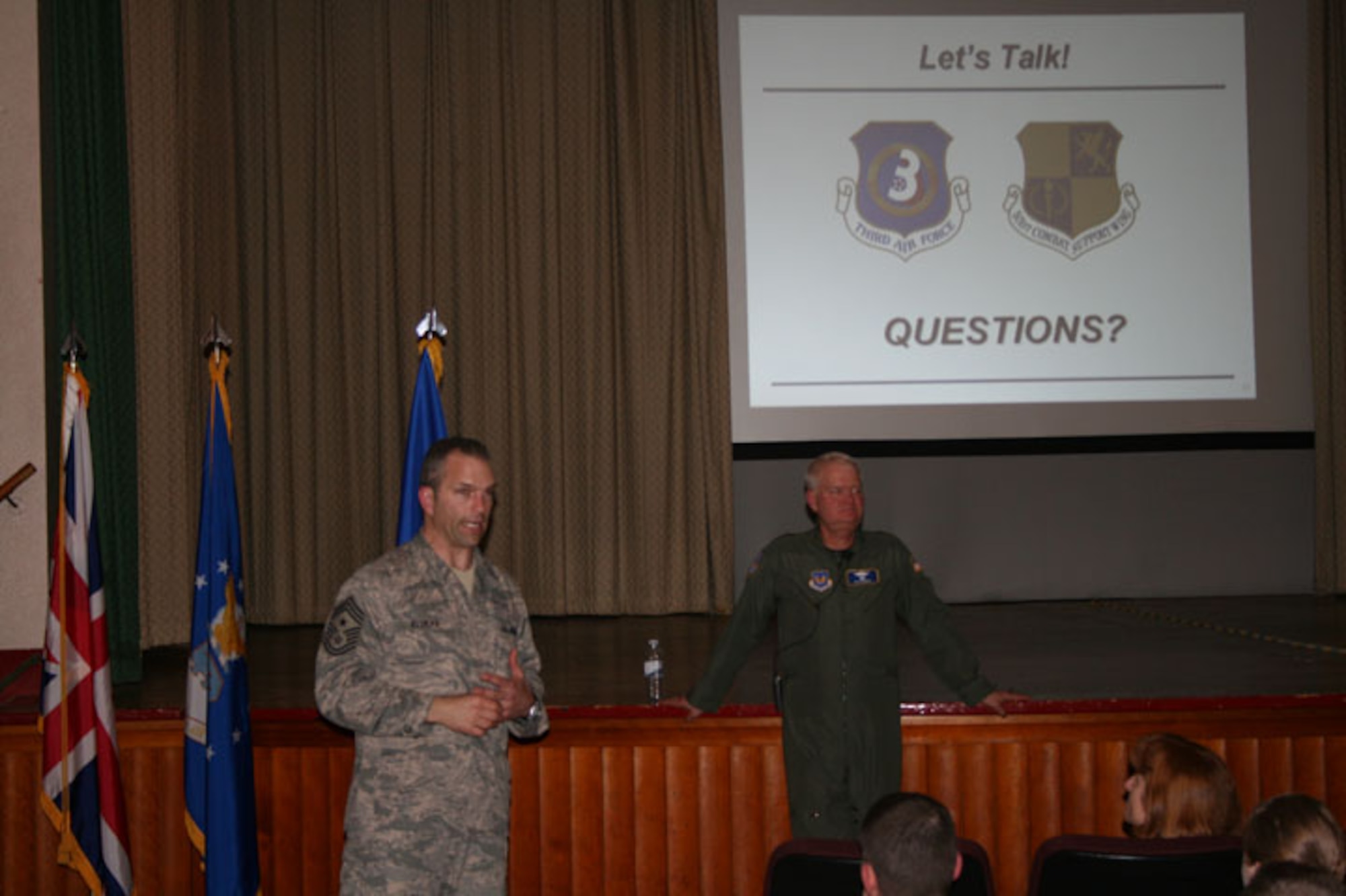 Lt. Gen. Rod Bishop, Third Air Force commander, and Chief Master Sgt. Marty Klukas, Third Air Force command chief, conduct an Airmen's Call in the base theater at RAF Alconbury (U.S. Air Force Photo by Tech. Sgt. Kristina Barrett)