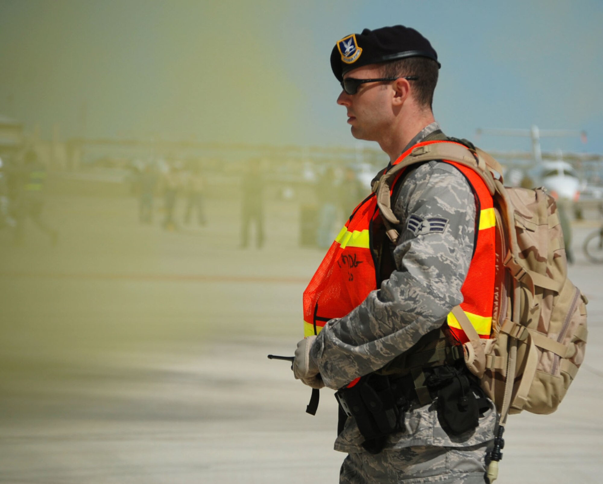 LAUGHLIN AIR FORCE BASE, Texas – Senior Airman Forrest George, 47th Security Forces Squadron, stands guard near the cordon during an exercise mimicking a grease fire on the flight line April 18. Laughlin conducted multiple exercises to prepare for the upcoming air show May 10. (U.S. Air Force photo by Airman 1st Class Sara Csurilla)