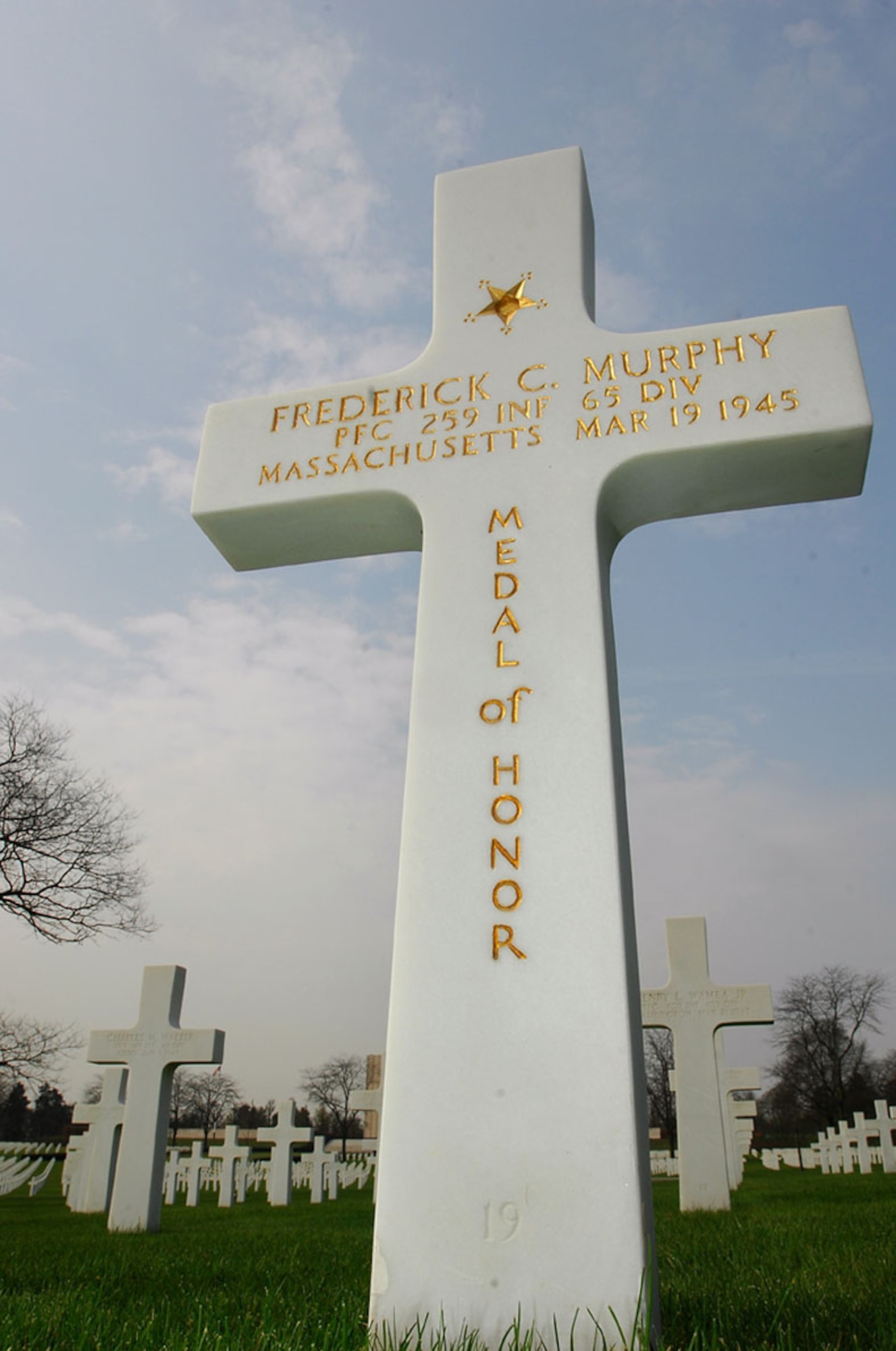 Each cross tells the story of a fallen member. This one was a recipient of the Medal of Honor. (US Air Force Photo by Airman 1st Class Kenny Holston)

