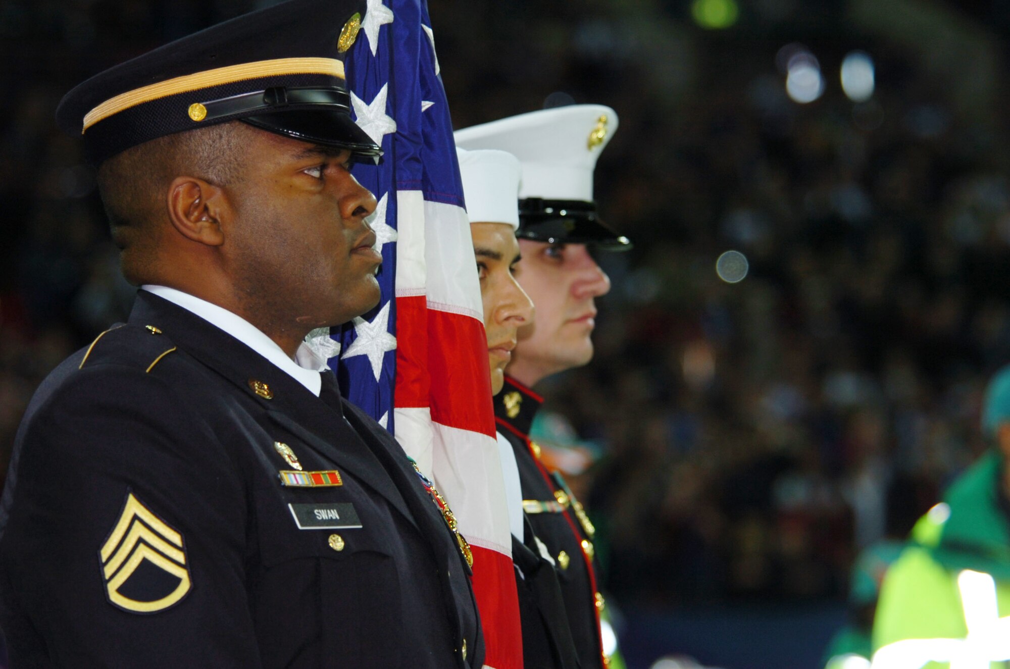 JIOCEUR Honor Guard performing at the first-ever NFL regular season football game played in London, England on October 28, 2007.  JAC Photographer Staff Sgt. Jocelyn L. Rich captured the intense focus of the members of the JAC honor guard in the moments before they took to the field during the game's opening ceremonies.  Staff Sgt. Rich who accompanied the honor guard was granted all-areas access - the only military photographer accredited to the NFL.(U.S. Air Force photo by Staff Sgt. Jocelyn L. Rich)
