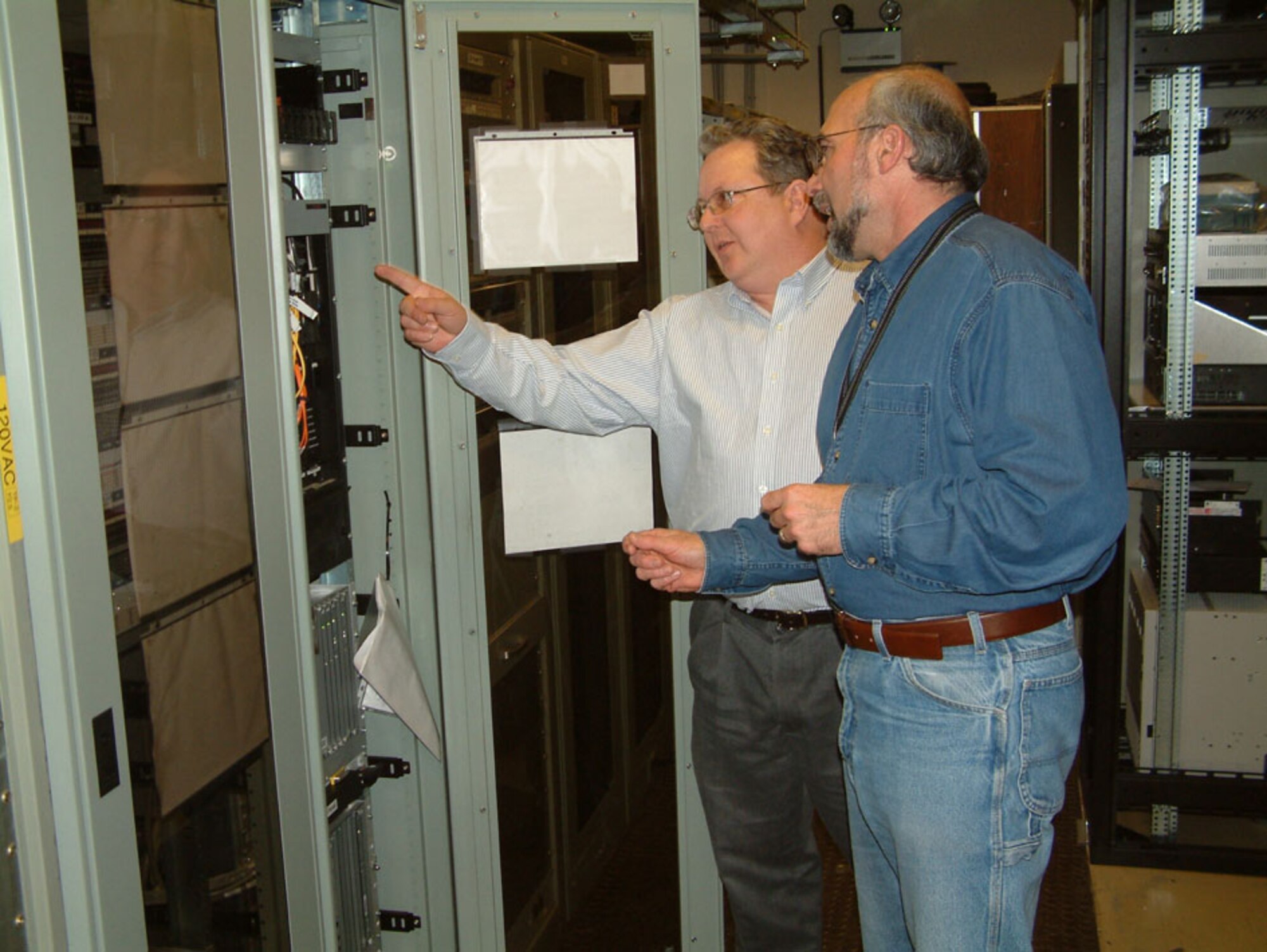 James Johnson and Michael Poli, U.S. Air Forces in Europe CSS Quality Assurance evaluators, conduct a contract surveillance at the Spangdahlem Technical Control Facility. The evaluators assess the contractor’s performance on the Northern Communications contract through scheduled and unscheduled surveillances at multiple sites throughout Europe.