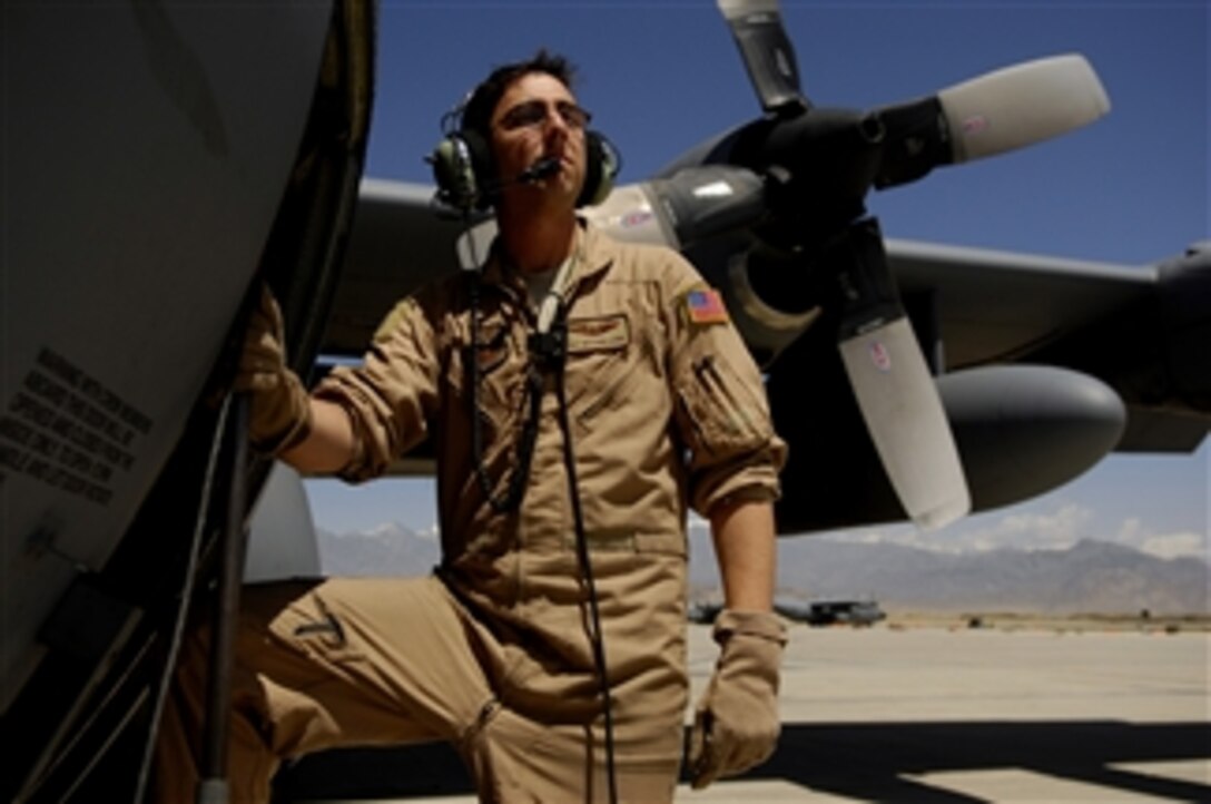 Staff Sgt. Michael Lynn, U.S. Air Force, stands by for the engine start-up of a C-130 Hercules aircraft prior to a cargo mission from Bagram Air Field, Afghanistan, on April 23, 2008.  Lynn is a loadmaster assigned to the 774th Expeditionary Airlift Squadron and deployed from the 105th Airlift Squadron, Tennessee Air National Guard, Nashville, Tenn.  