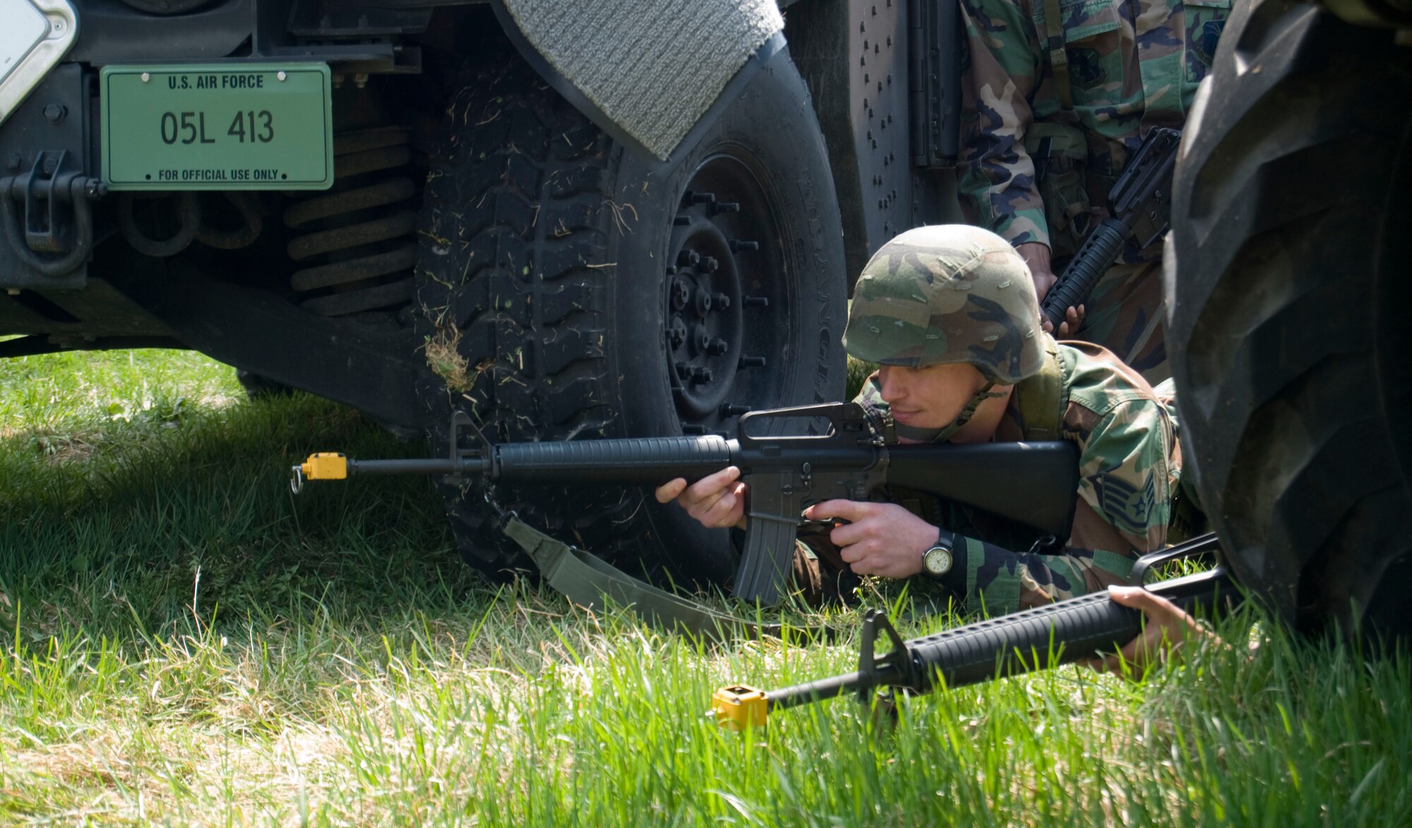 MISAWA AIR BASE, Japan -- Staff Sgt. Charles Cooper, Misawa Security Operations Center, defends a simulated rally point using blank ammunition at Camp Defender on April 25, 2008. Sergeant Cooper was one of the 68 U.S. Air Force and Japan Air Self Defense Force personnel attending Expeditionary Combat Skills Training that day at Misawa Air Base. (U.S. Air Force photo by Senior Airman Samuel Morse)