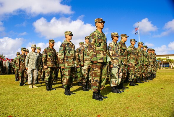 Members of the Guam Air National Guard's 254th Civil Engineer Squadron stand by with excitement during a Flagging Ceremony at Andersen Air Force Base as they convert to the 254th REDHORSE Squadron April 4. They will be an ssociate unit with the Air Force's 554th RED HORSE Squadron. (Courtesy Photo)
