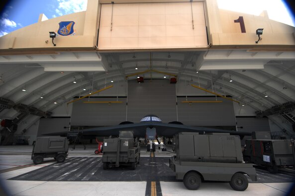 ANDERSEN AIR FORCE BASE, Guam -- A B-2 Spirit stealth bomber is hooked up to aerospace ground equipment by a maintenance team supporting the remaining B-2 Spirits at Andersen AFB. The equipment provides the jet’s power supply while the team performs weekly checks to ensure the B-2 Spirit bomber stays at a mission-ready status. This requires lots of hard work and a huge team effort by all maintainers working on the multi-role stealth bomber. The B-2s here have remained suspended pending the results from a safety investigation board following the first-ever crash of a stealth bomber Feb. 23 here, at Andersen AFB.  The Maintainers are from the 36th Expeditionary Aircraft Maintenance Squadron and are deployed from the 509th Bomb Wing, Whiteman, AFB, Mo. (U.S. Air Force photo by Staff Sgt. Vanessa Valentine)
