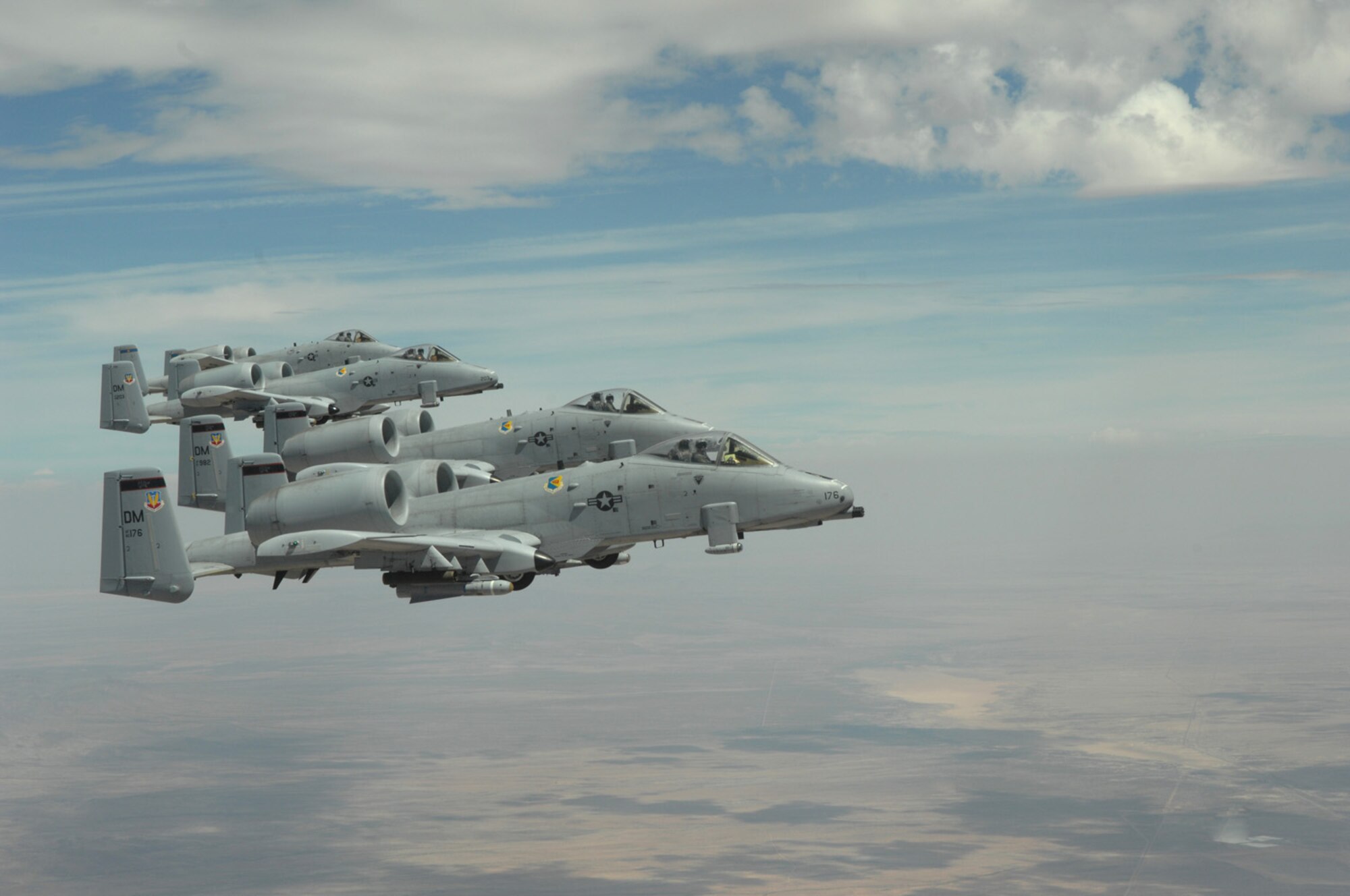 Four A-10s from Davis-Monthan fly in formation over Arizona April 29. The A-10s received in-flight refueling from a KC-135 from an Arizona Air National Guard unit based out Phoenix. The KC-135 was transporting Tucson community leaders to Nellis Air Force Base, Nev., for a Civic Leader Tour. (U.S. Air Force photo by Senior Airman Alesia Goosic)