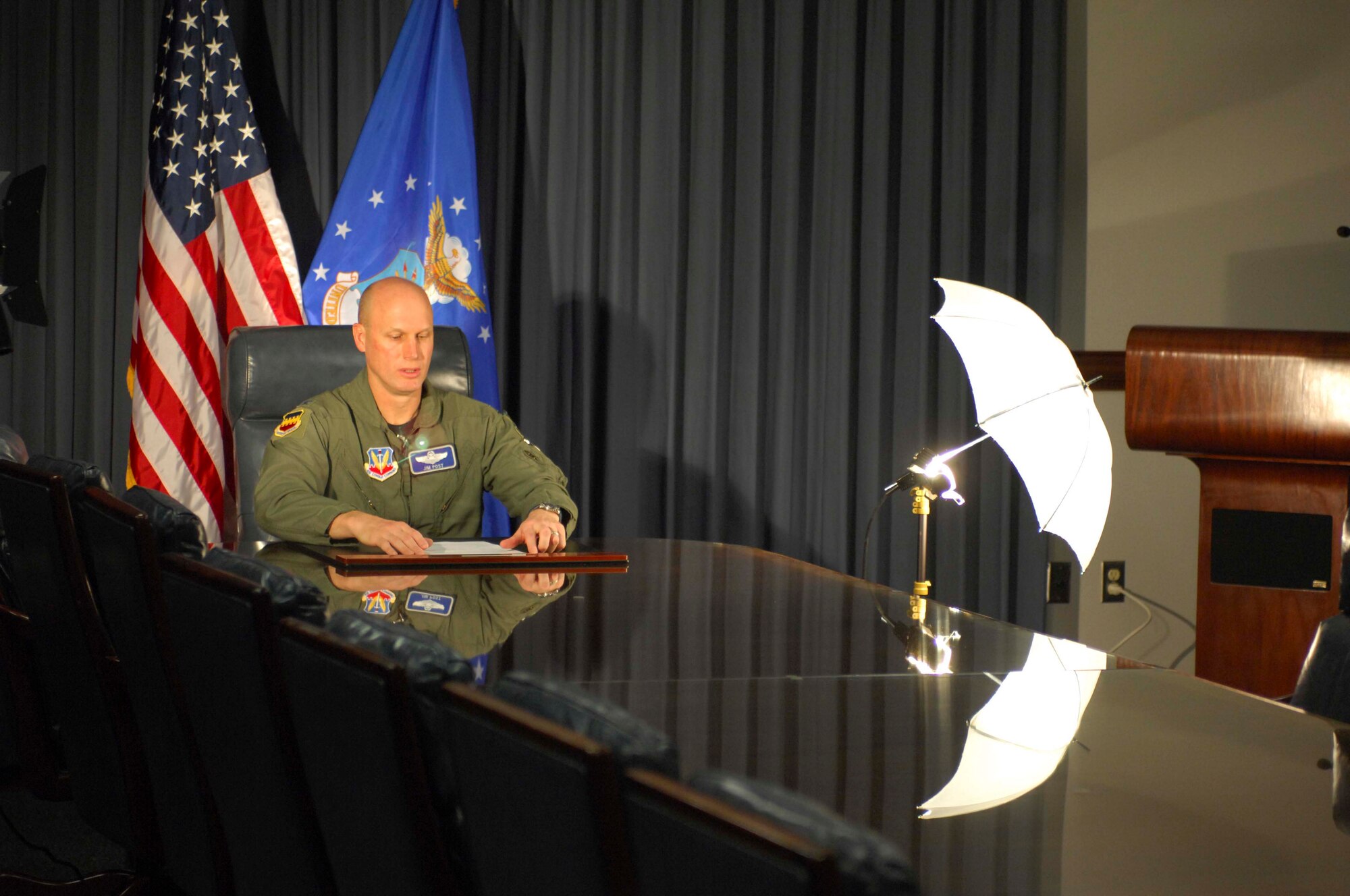 SHAW AIR FORCE BASE, S.C. -- Col. James Post, 20th Fighter Wing commander, reviews the script prior to filming a commercial about safety for the Commanders Access Channel April 24. Commercials showcasing safety for the 101 critical days of summer and Shaw's Sept. 6 air show will air on the CAC beginning in early May. (U.S. Air Force Photo/Staff Sgt. Henry Hoegen)