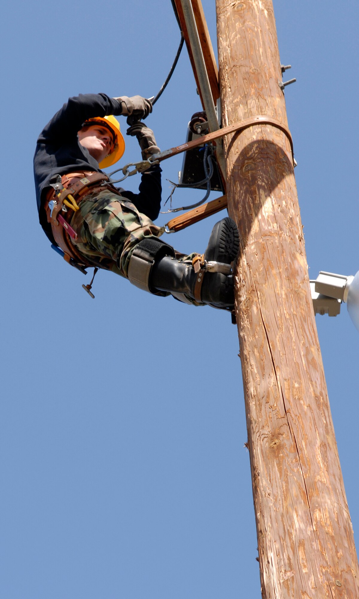 VANDENBERG AIR FORCE BASE, Calif. --  Airman 1st Class David Miron of the  30th Civil Engineer Squadron repairs a damaged wire during the North Star exercise April 24 here. (U.S. Air Force photo / Senior Airman Christopher Hubenthal)