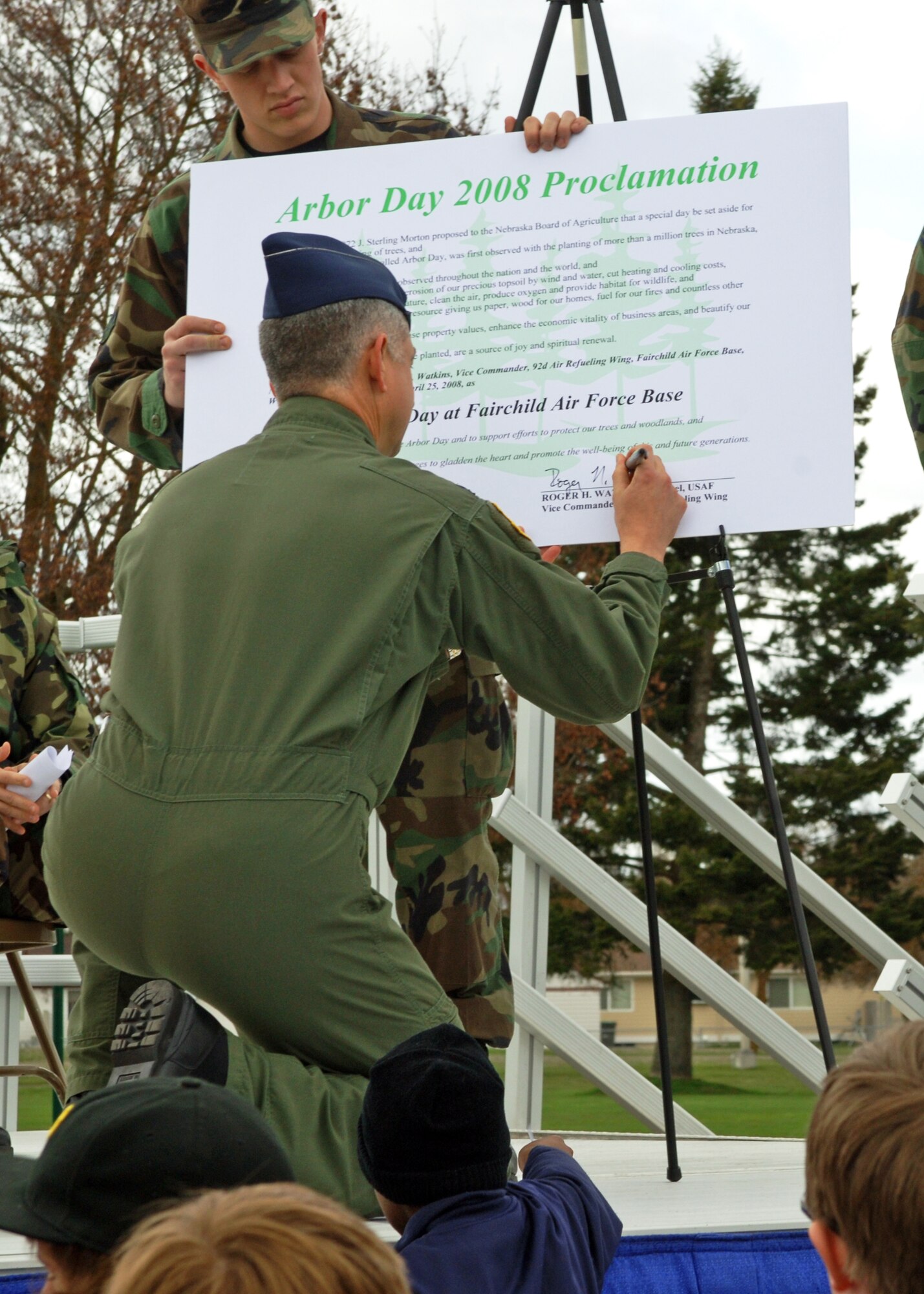 FAIRCHILD AIR FORCE BASE, Wash. – Col. Roger Watkins, 92nd Air Refueling Wing acting commander, signs the Arbor Day 2008 Proclamation at Miller Park April 25. In 1872 Julius Morton proposed that a special day be set aside dedicated to tree planting and increasing awareness and importance of trees, creating Arbor Day. (U.S. Air Force photo / Airman 1st Class Melissa Barnett)
