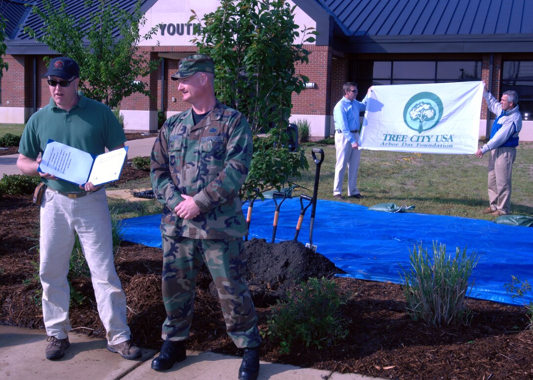 LANGLEY AIR FORCE BASE, Va. --  Col. Kevin Altman, 1st Mission Support Group commander, gives a proclamation for a tree planting ceremony on behalf of the 1st Fighter Wing commander, Brig. Gen. Mark Barret, here April 29.  The ceremony was to celebrate both Arbor Day and Earth Day and to show the Air Force's support of the environment.  (U.S. Air Force photo/Senior Airman Christopher L. Ingersoll)