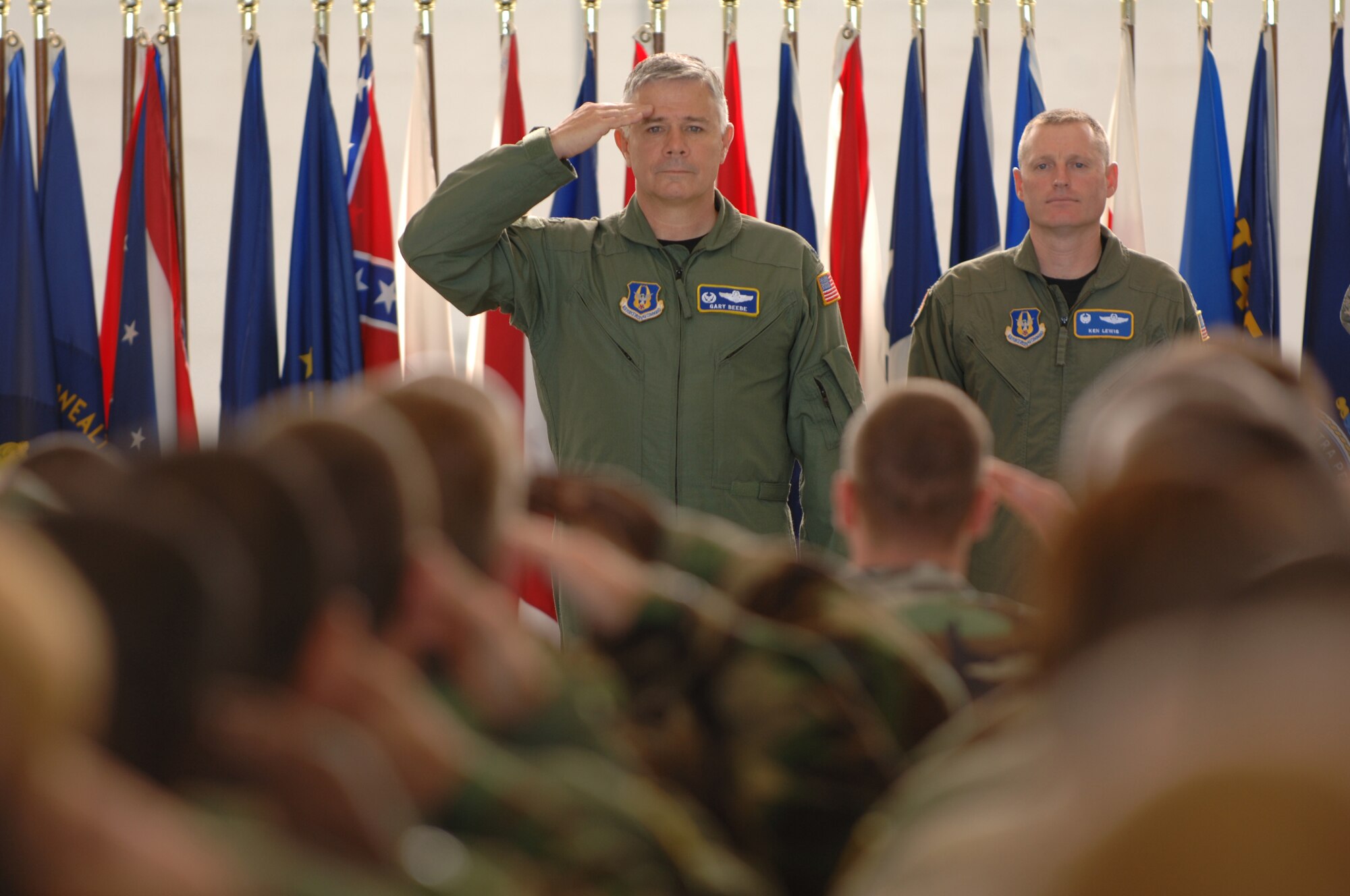 Col. Gary E. Beebe renders a final salute to the men and women of the 927th Air Refueling Wing at MacDill Air Force Base, Fla., April 27, 2008, after relinquishing command of the unit to Col. Kenneth D. Lewis, Jr.