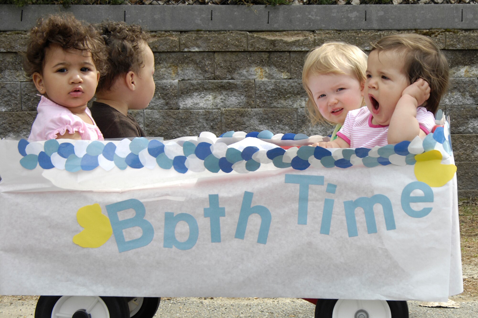 HANSCOM AFB, Mass. – Children from Room 16 at the Child Development Center participated in the Fantastic Float parade on April 25. Pictured here (front - left to right), Lahela Haney, Saphira Hernandez-Cruz and (back - left to right) Malachi Parker and Katherine Geise.  (U.S. Air Force photo by Linda LaBonte Britt)