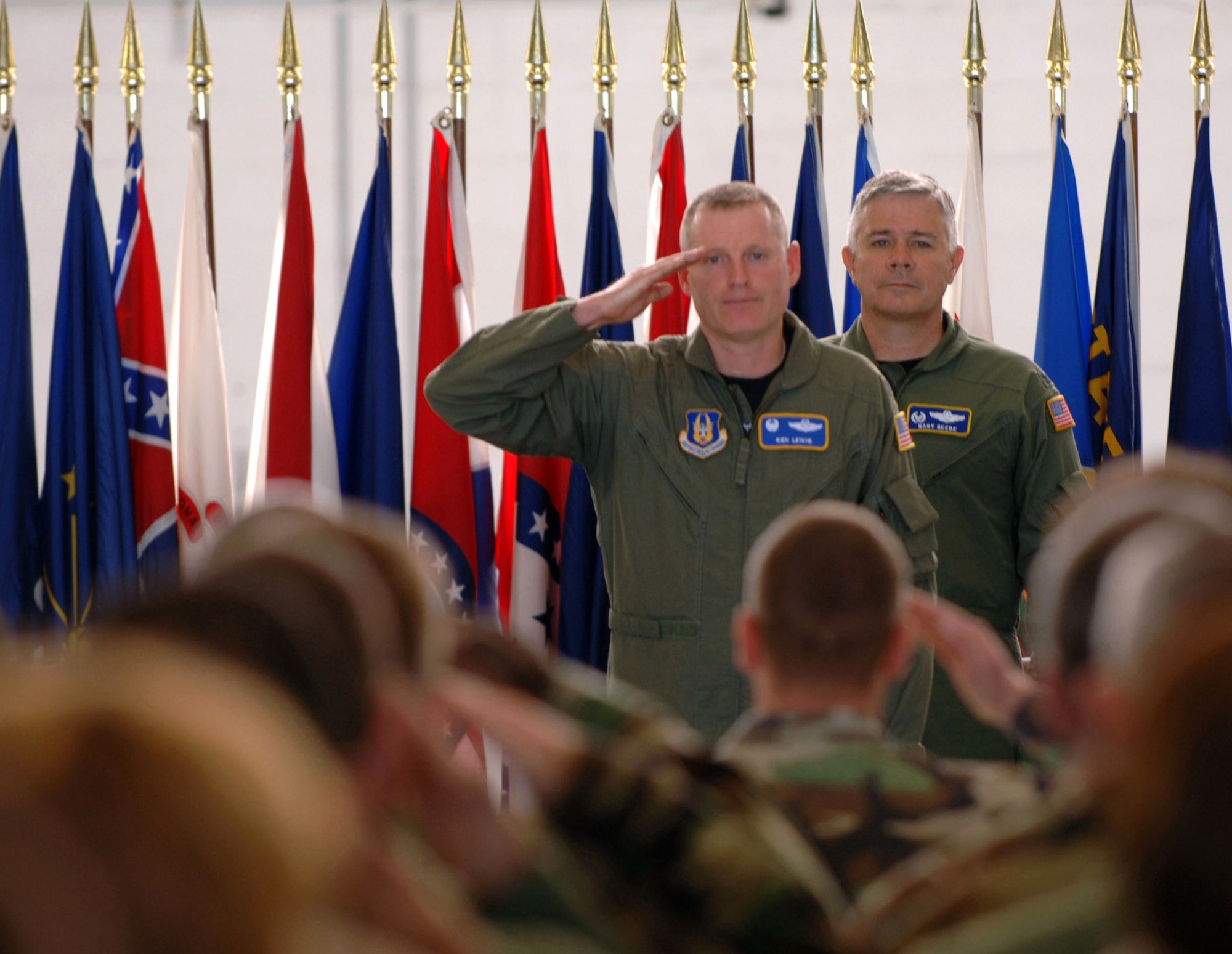 Col. Kenneth Lewis salutes the men and women of the 927th Air Refueling Wing at MacDill Air Force Base, Fla., April 27, after accepting command of the unit from Col. Gary Beebe. Colonel Beebe returned to Selfridge Air National Guard, Mich., to command 4th Air Force, Detachment 2, which will handle Air Force Reserve activity at that base until it is phased out in 2009. (U.S. Air Force photo)