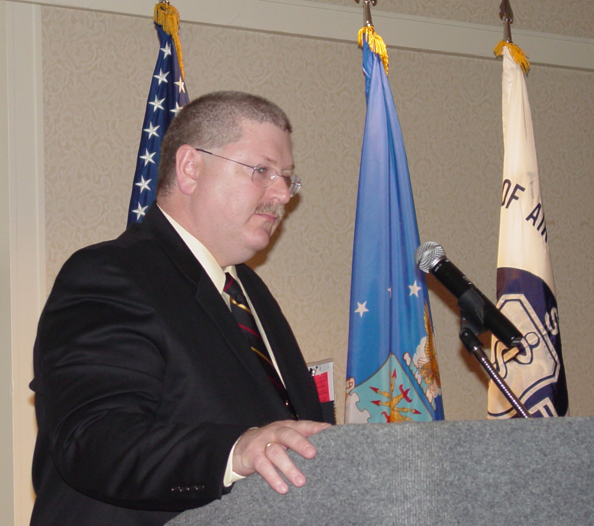 Col. (Dr.) Don Jenkins, chief of trauma at Wilford Hall Medical Center, accepts the Society of Air Force Clinical Surgeons' Excalibur Award during the society's scientific symposium in Cincinnati, Ohio, April 12-17.  The award recognizes the person who has done the most for AF surgery. (U.S. Air Force Photo)