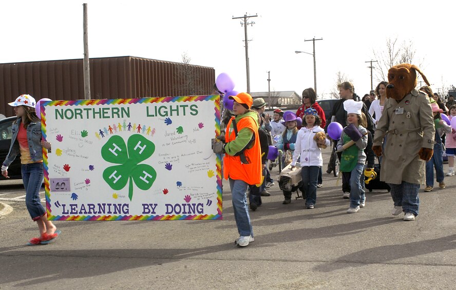 MINOT AIR FORCE BASE, N.D. -- In celebration of the Month of the Military Child a parade and block party was held here April 25. Children of military members paraded from J.R. Rockers to the Youth Center. (U.S. Air Force photo by Airman 1st Class Jesse Lopez)
