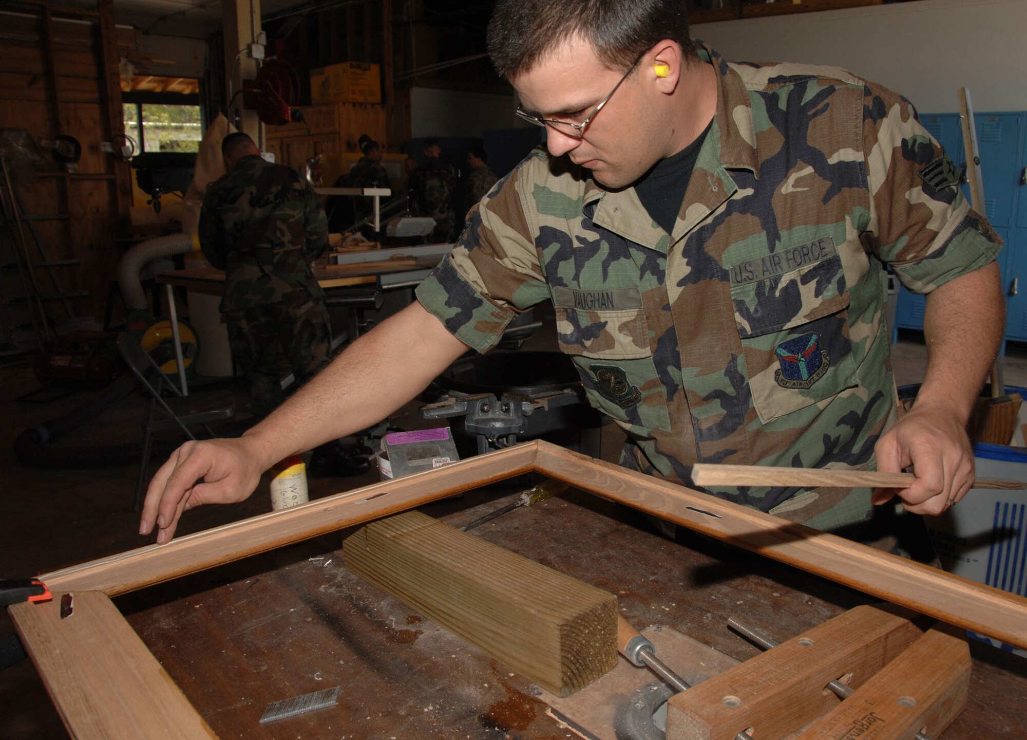 SEYMOUR JOHNSON AIR FORCE BASE, N.C. -- Senior Airman Anthony Vaughn hones his carpenter skills during a recent unit training assembly.  U.S. Air Force photo/TSgt. Gillian Albro