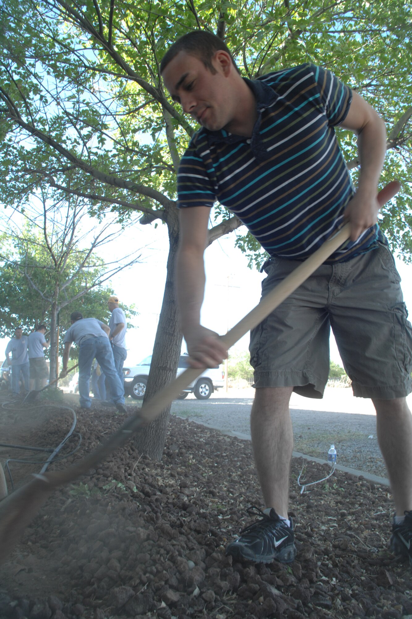 ALAMOGORDO, N.M.--Airman 1st Class Jonathan Peabody, 49th Logistics Readiness Squadron, landscapes April 24 during the United Way of Otero County Day of Caring in Alamogordo, N.M. More than 450 volunteers participated in the event. (U.S. Air Force photo/Airman 1st Class Jamal D. Sutter)