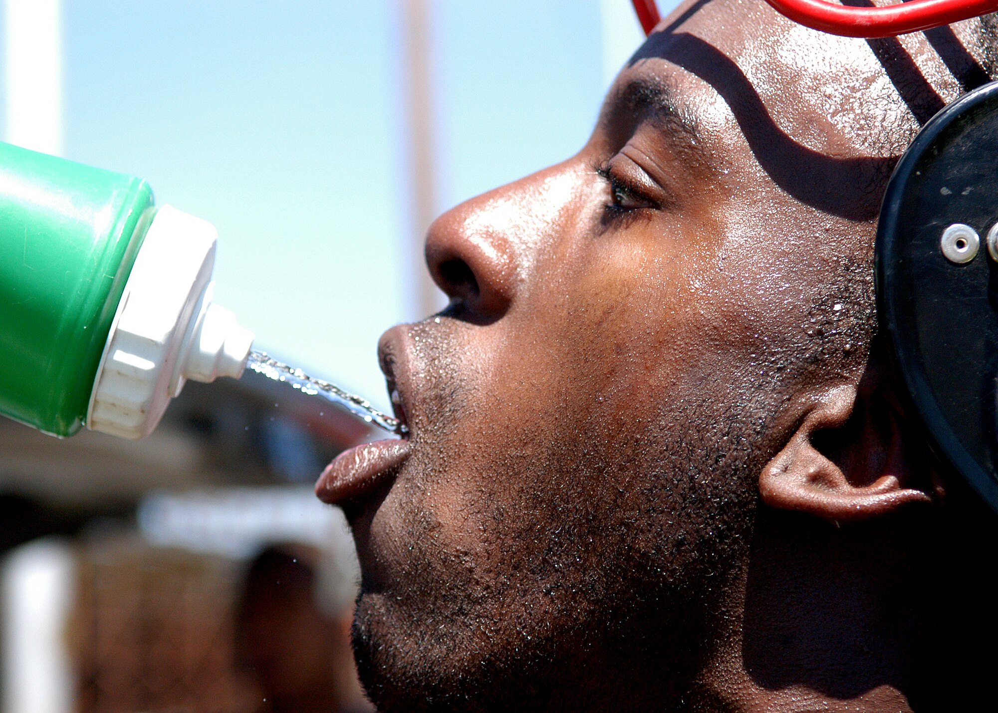 Airman First Class Andre Powell of the  49th Comptrollers Squadron hydrates after a hard practice on April 12 2008 in Alamogordo, N.M. 