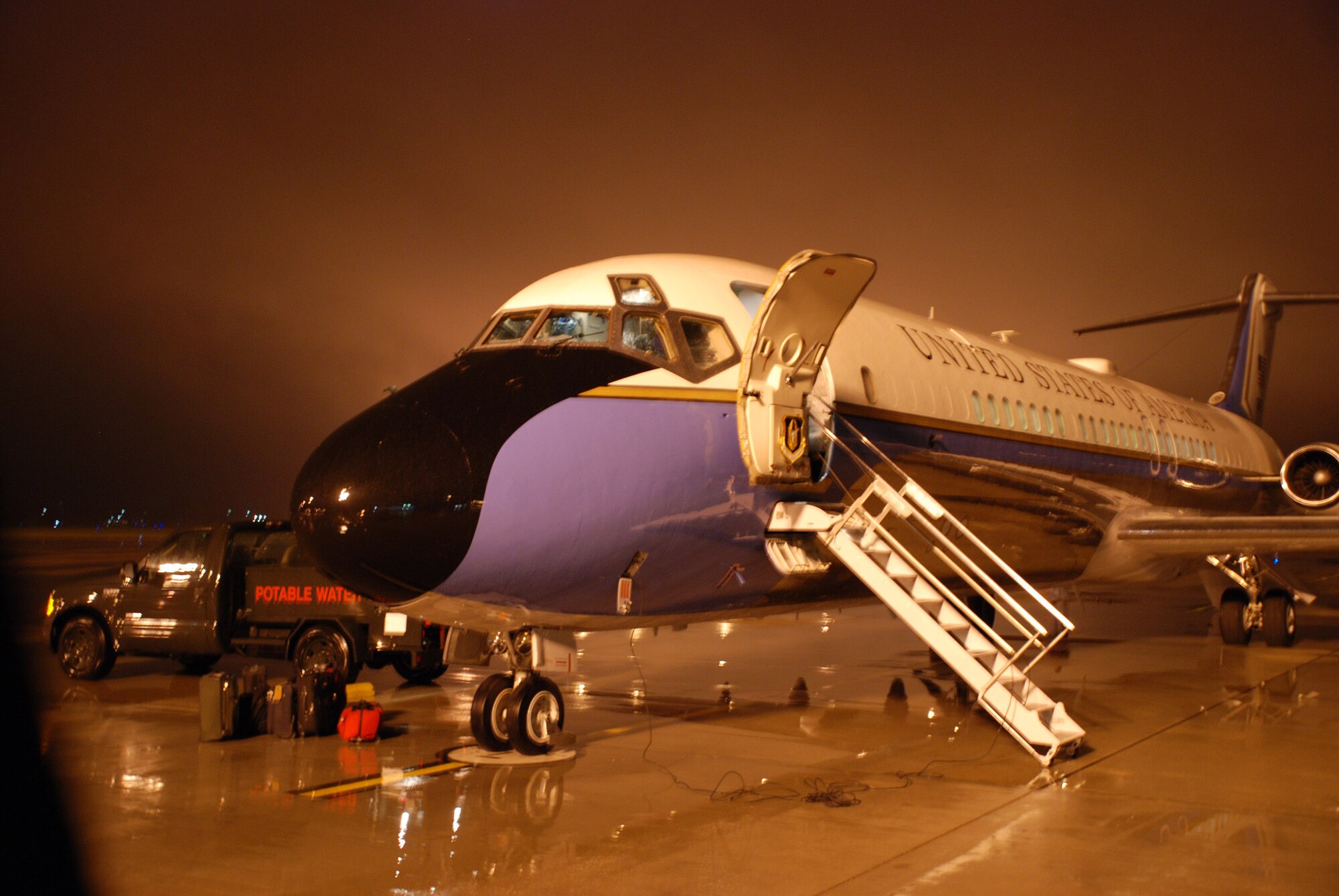 A C-9C distinguished visitor aircraft stands ready in the early morning fog before taking off on a special air mission recently.  The 932nd Airlift Wing, an Air Force Reserve Command unit in Illinois, flies the C-9C and the C-40C at Scott Air Force Base.  Photo/Maj. Stan Paregien