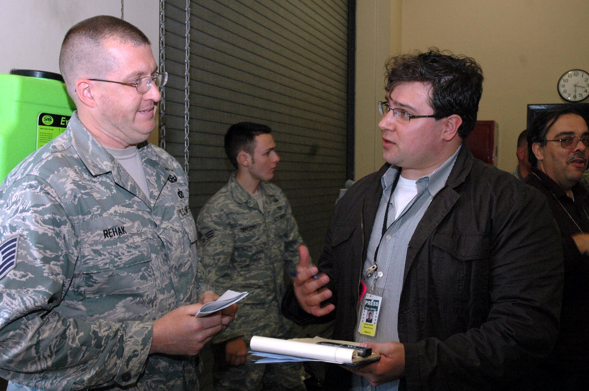 Reporter Matthew McGrath from the Asbury Park Press of Asbury Park, N.J., interviews Tech. Sgt. John Rehak, 305th Civil Engineer Squadron, McGuire Air Force Base, N.J., about his recent deployment experiences April 30, 2008, on McGuire.  The interview was part of an event for Team McGuire Media Day coordinated by the 305th Air Mobility Wing Public Affairs Office.  (U.S. Air Force Photo/Tech. Sgt. Scott T. Sturkol)