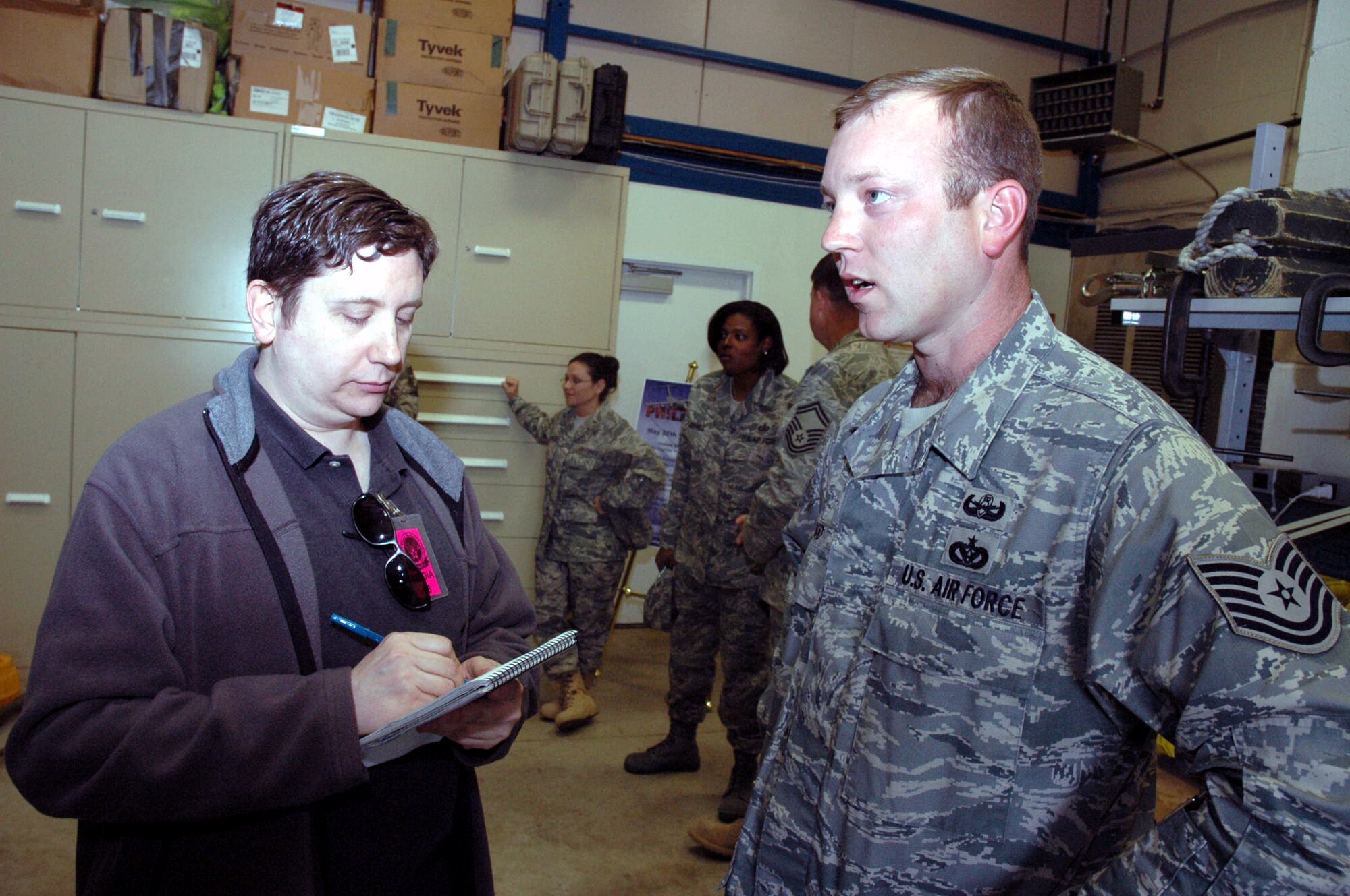 Reporter Jeff Trently from the Trenton Times of Trenton, N.J., interviews Tech. Sgt. Vandiver Hood, U.S. Air Force Expeditionary Center, Fort Dix, N.J., about his recent deployment experiences April 30, 2008, on McGuire Air Force Base, N.J.  The interview was part of an event for Team McGuire Media Day coordinated by the 305th Air Mobility Wing Public Affairs Office.  (U.S. Air Force Photo/Tech. Sgt. Scott T. Sturkol)