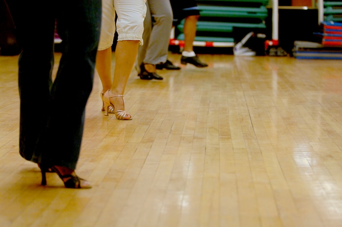 Members of the salsa dance class practice at the Fitness and Sports Center April 29. (U.S. Air Force photo/Senior Airman Nicholas Pilch)