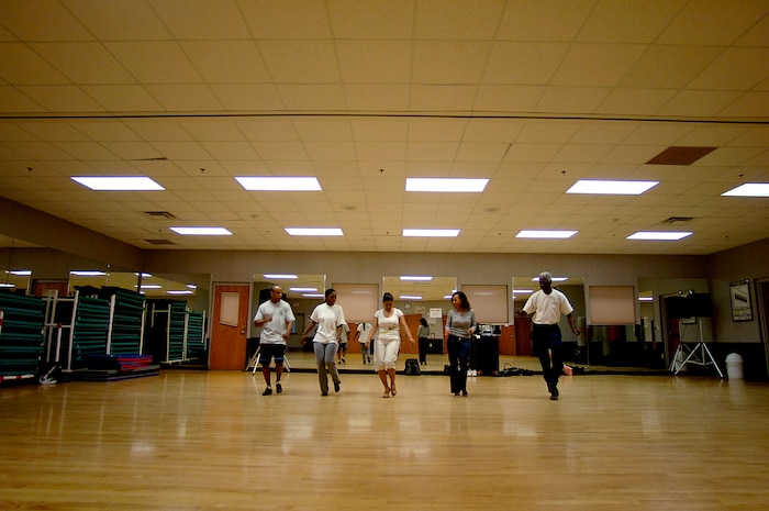 Members of the salsa dance class practice at the Fitness and Sports Center April 29. (U.S. Air Force photo/Senior Airman Nicholas Pilch)